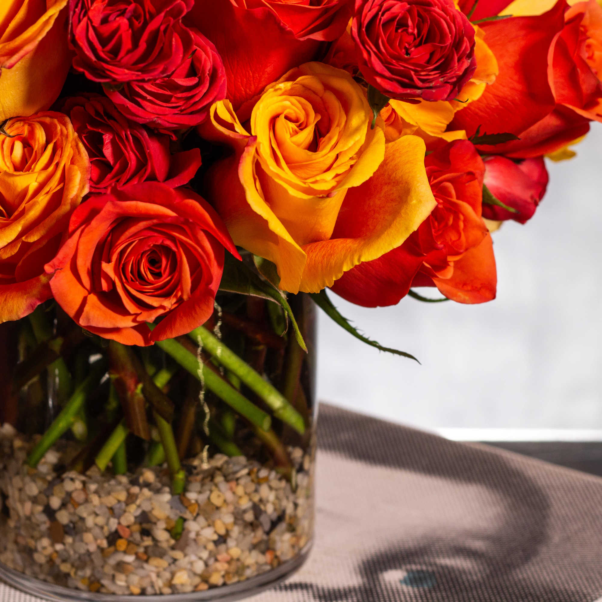 Crafting a stunning floral arrangement in a 5x5 cylinder vase with an