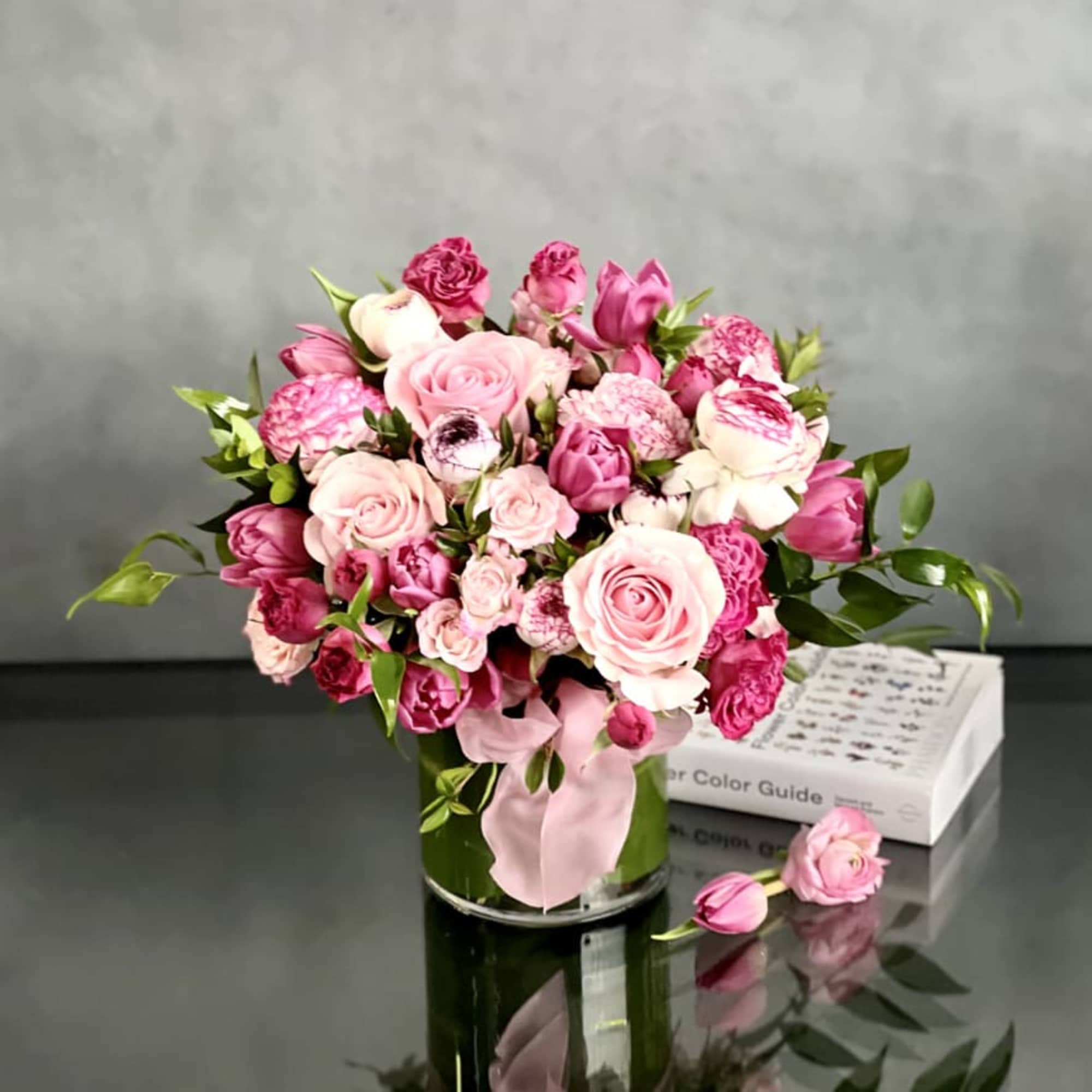 A stunning blend of pinks, creams, and touches of greens are combined