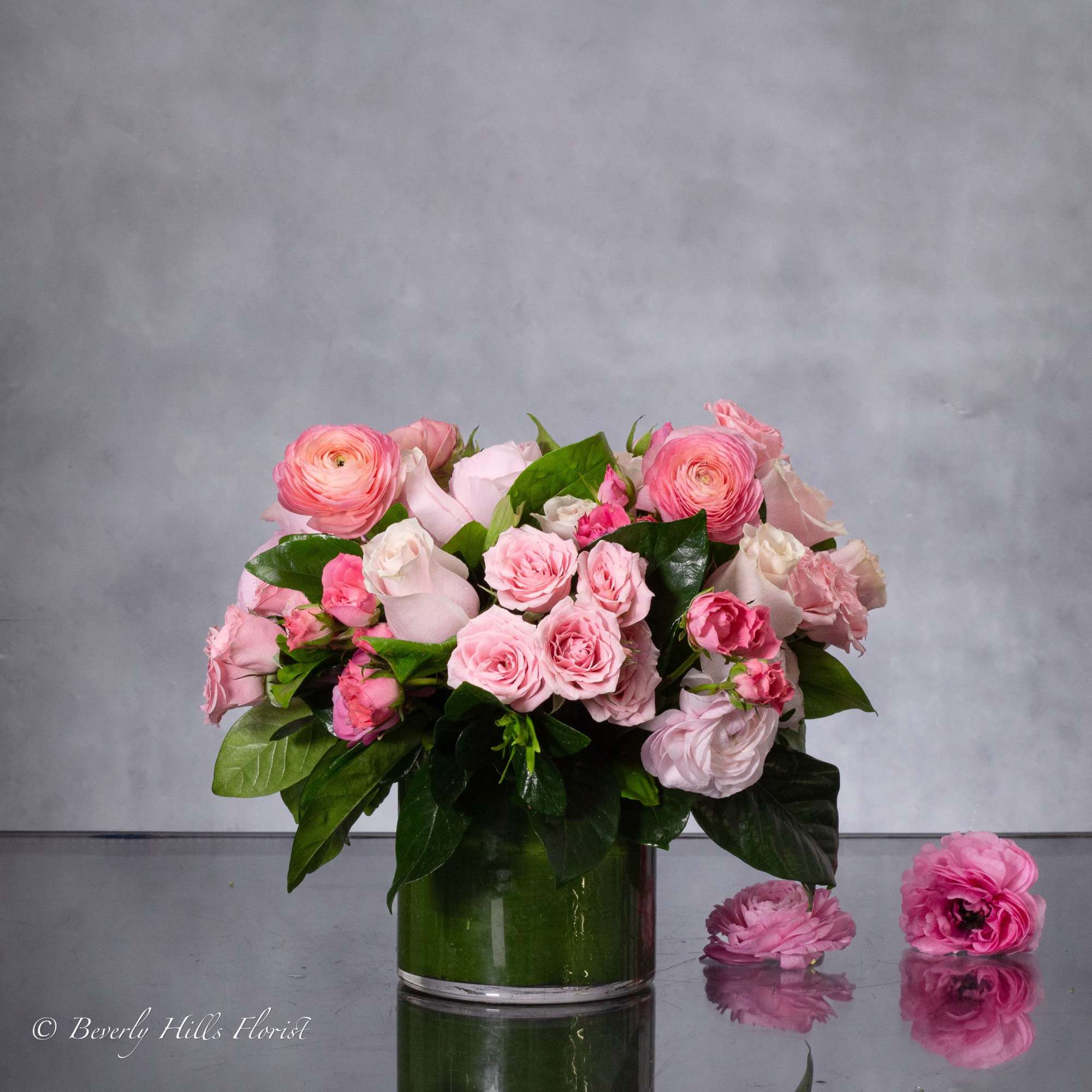 A stunning blend of pinks, creams, and touches of greens are combined