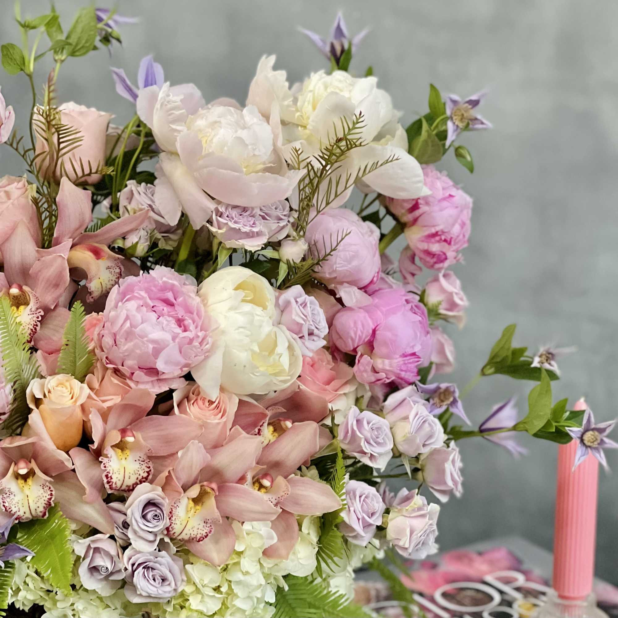A sweet touch to a beautiful arrangement. In this piece, we have