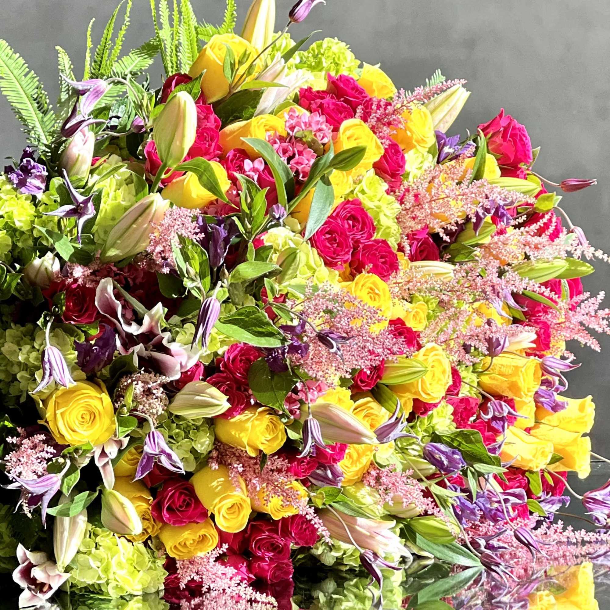 An exquisite and Large bouquet bursting with a vibrant assortment of seasonal