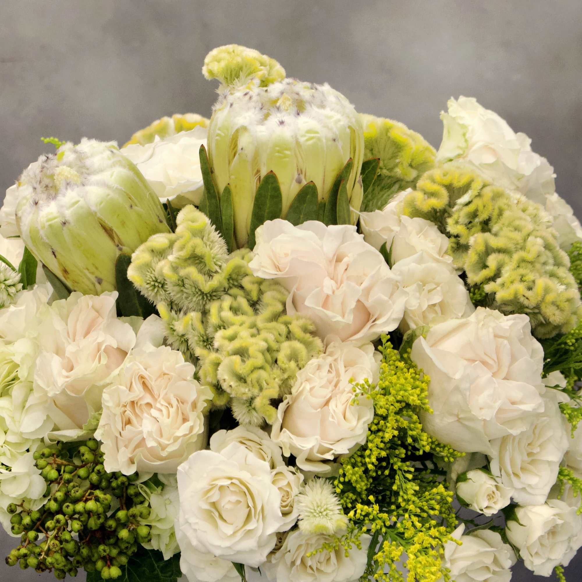 Perfectly pure. Perfectly elegant. Astonishingly gorgeous. This mixed arrangement of  
