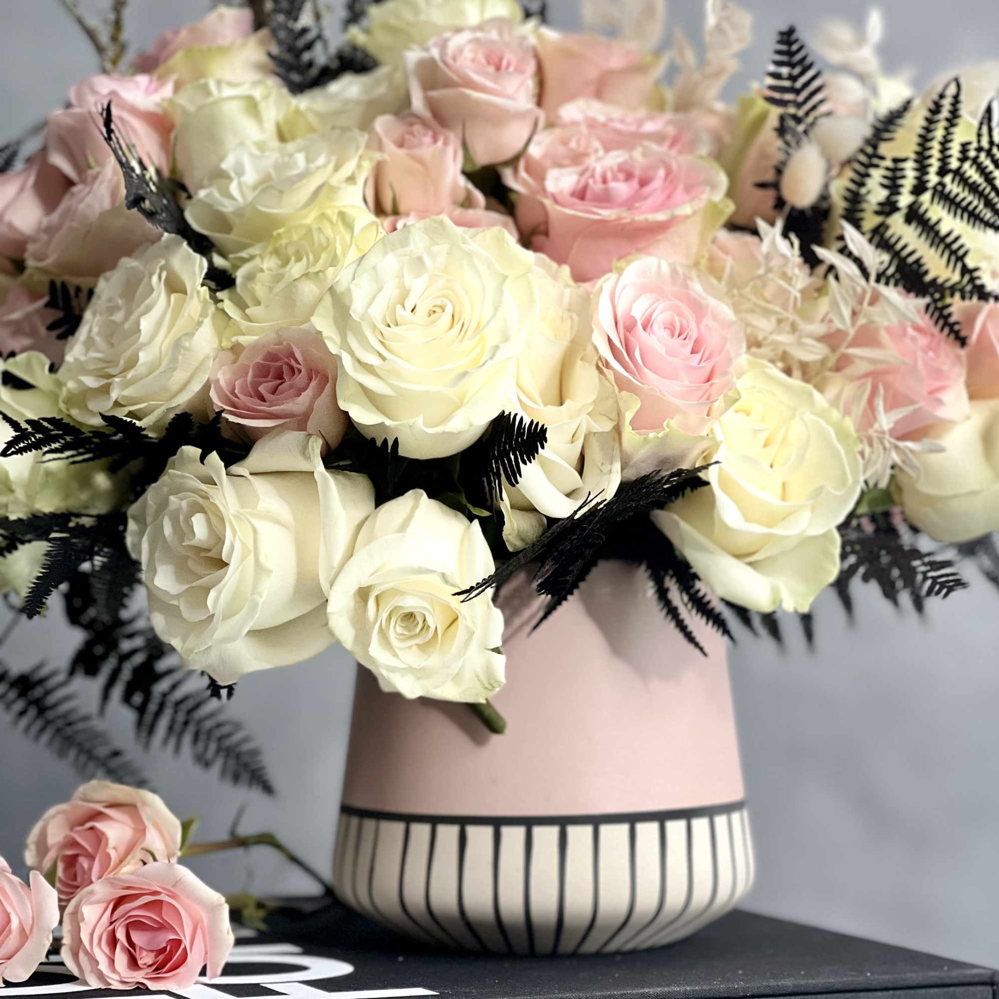 A unique fall floral mix expressed elegantly with neutral tones and splashes