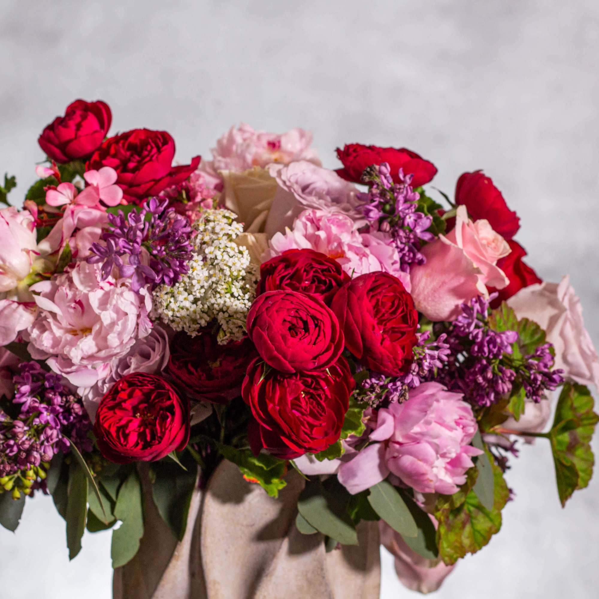 Immerse yourself in a world of seduction with our enchanting floral creation.
