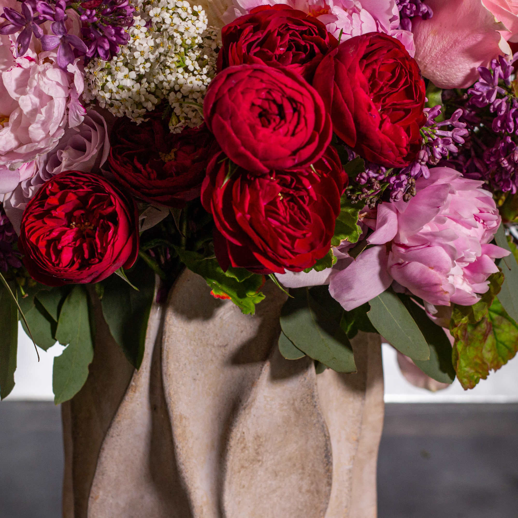 Immerse yourself in a world of seduction with our enchanting floral creation.