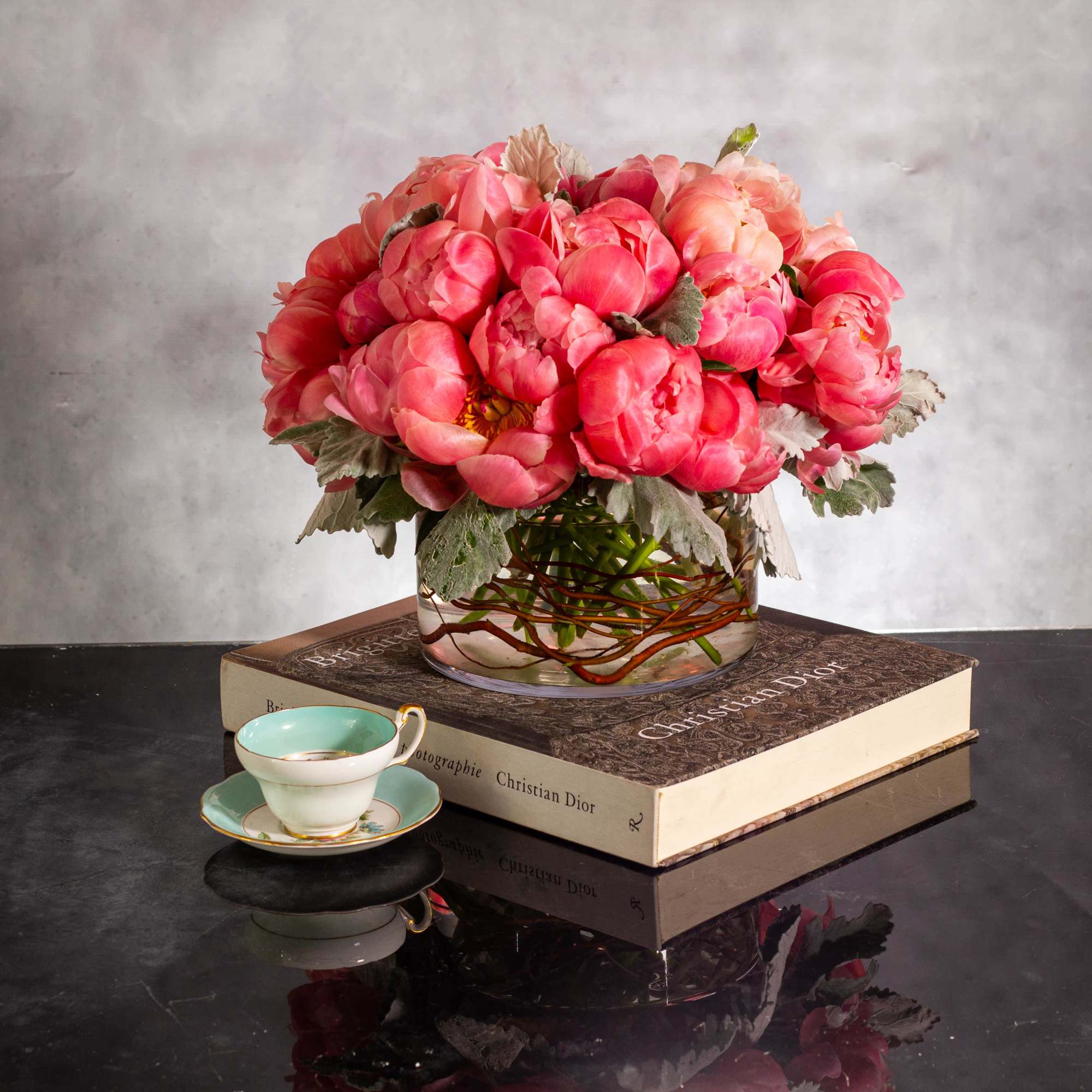 Immerse yourself in a sophisticated floral display featuring coral pink single petal
