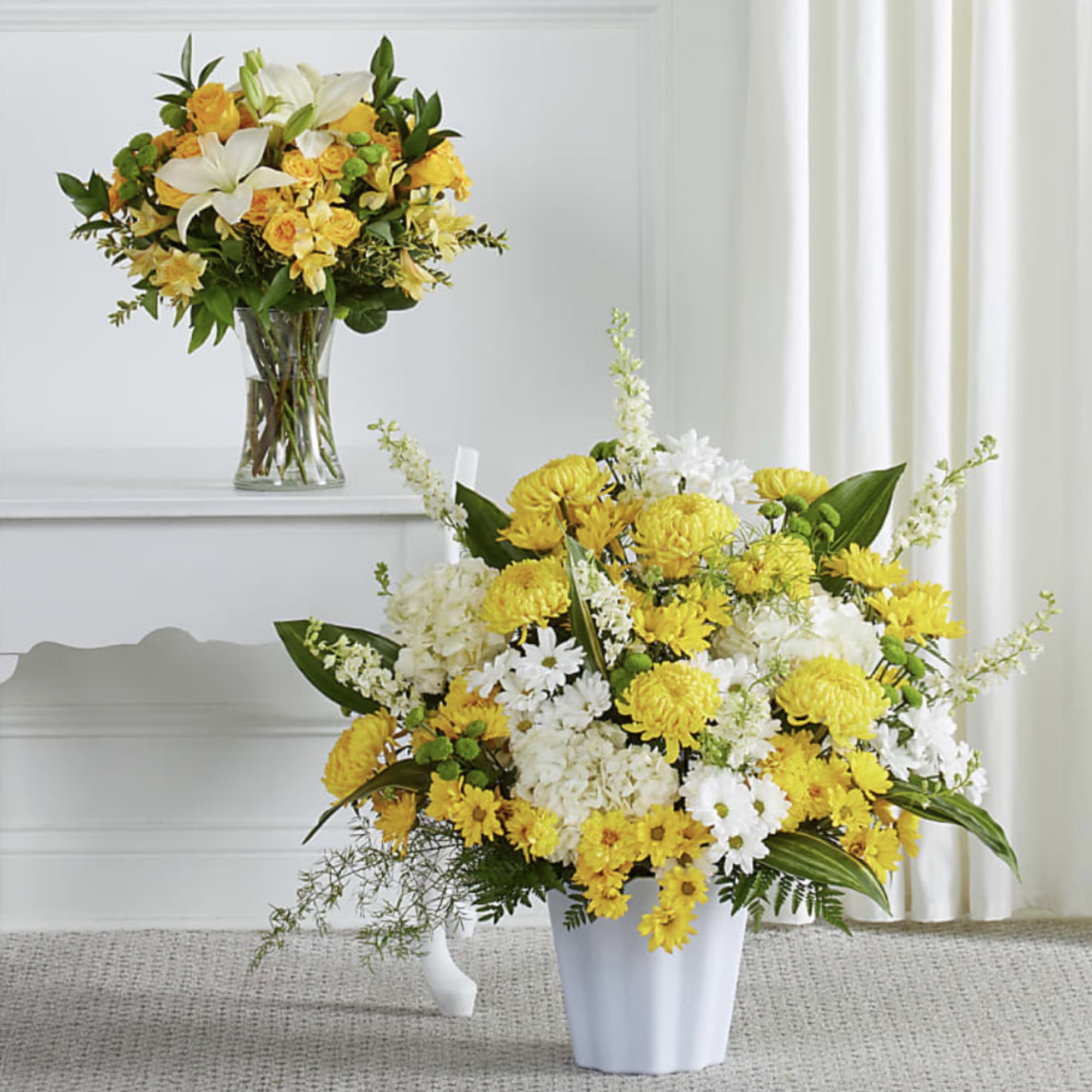 This gloriously golden sympathy set features traditional arrangements meant for celebrating the This gloriously golden sympathy set features traditional arrangements meant for celebrating the