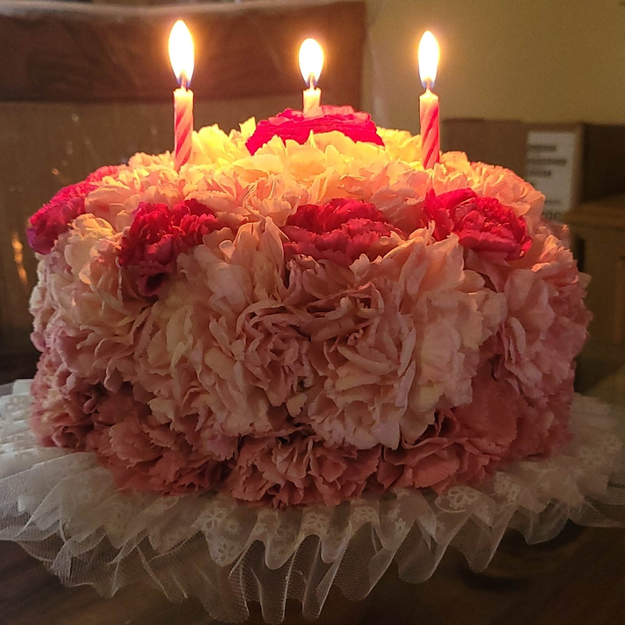 This delicate flower cake is a unique way to send your birthday
