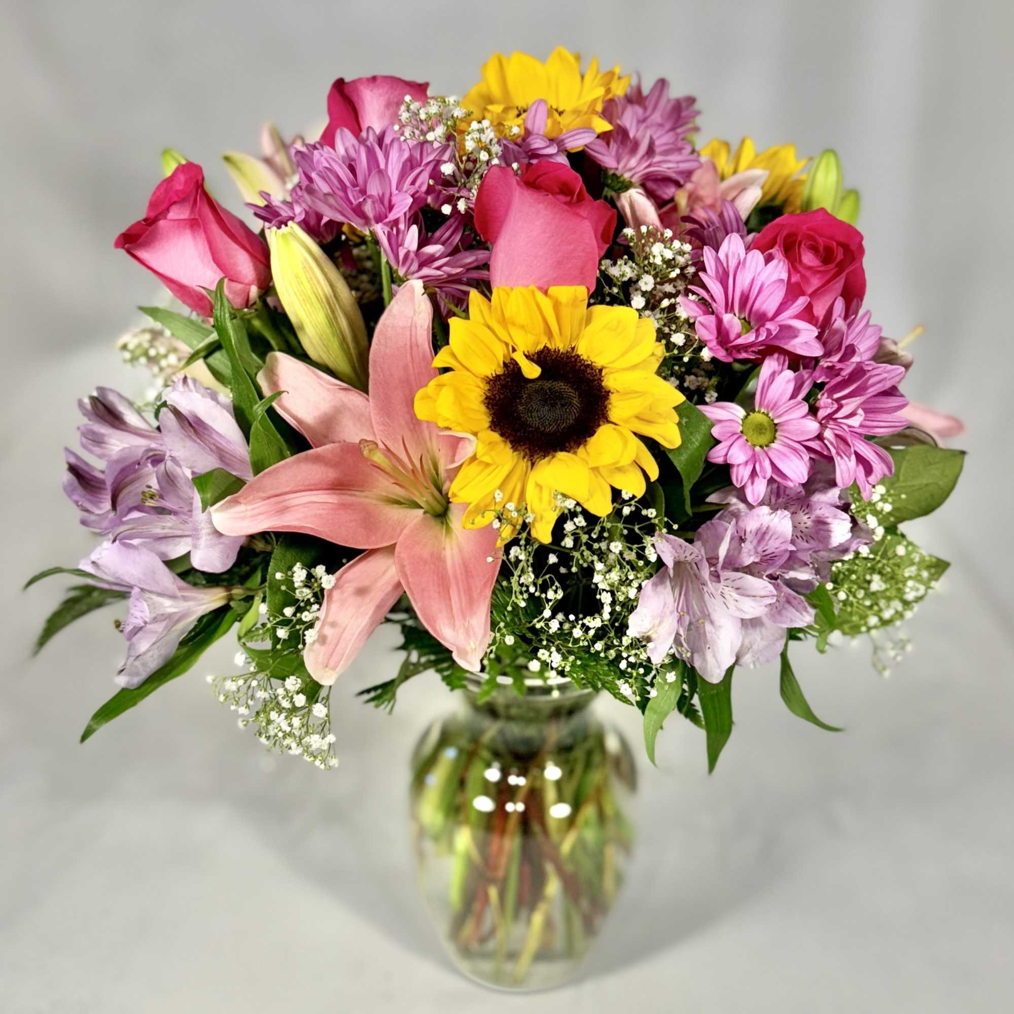 This Summer Sun arrangement is perfect for any occasion! It will definitely