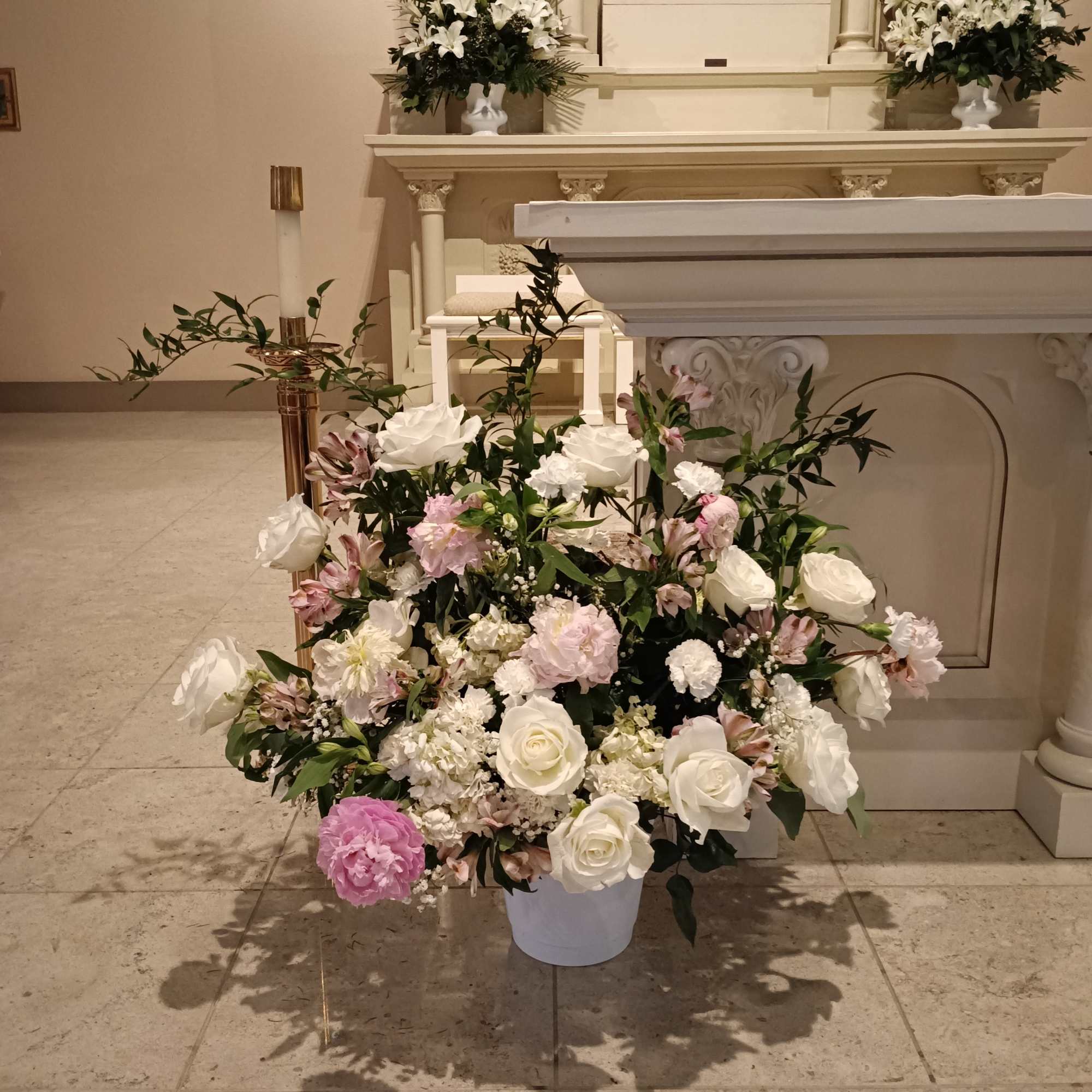 Beautiful pink and white roses, peonies, carnations, alstroemerias, white delphinium and other