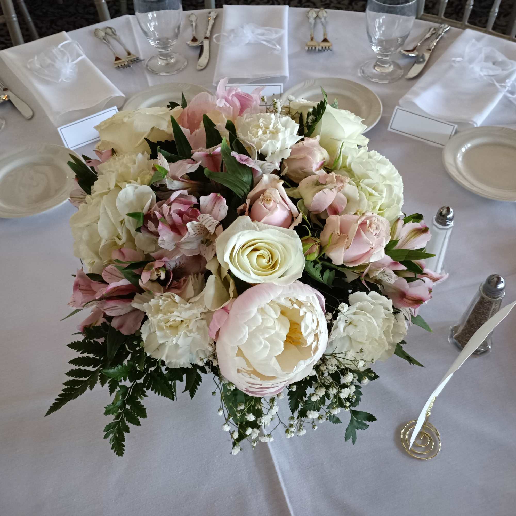 beautiful pastel classical compote shaped plastic gold vase with peonies, roses, alstroemeria
