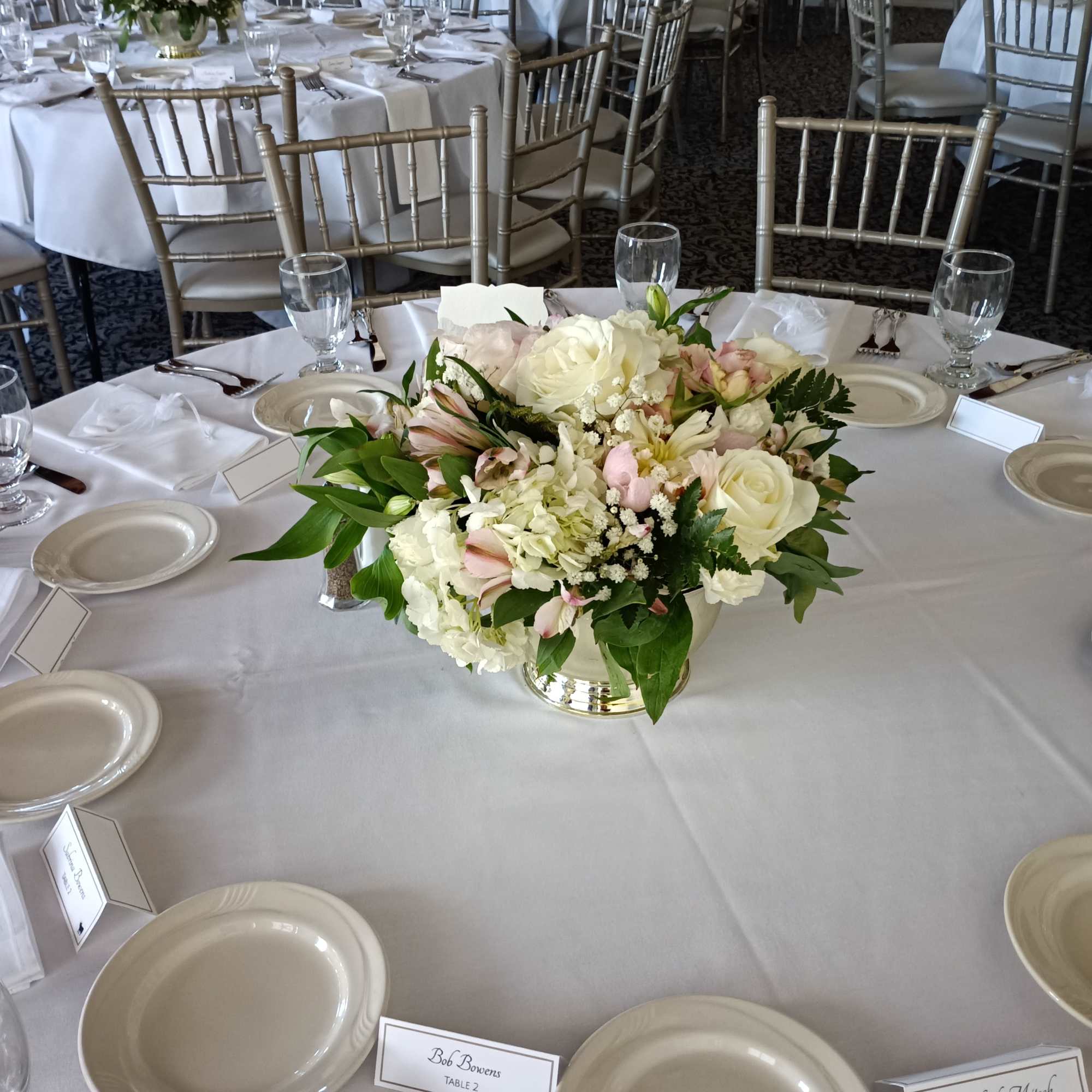 beautiful pastel classical compote shaped plastic gold vase with peonies, roses, alstroemeria