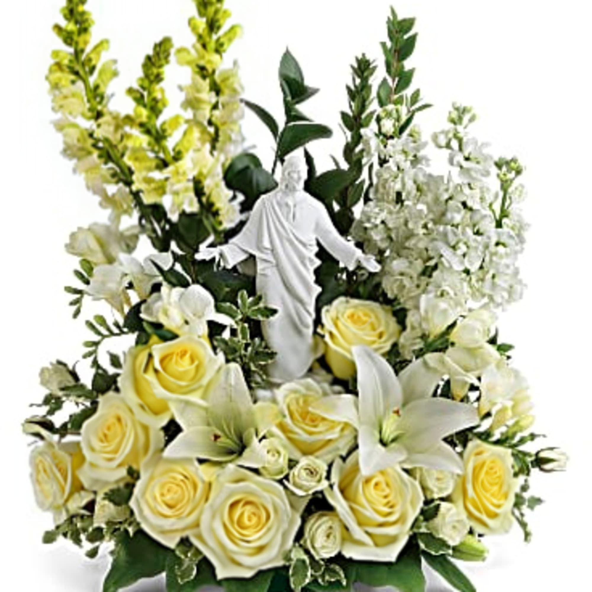 This inspiring piece is filled with white lilies, stock, spray roses and