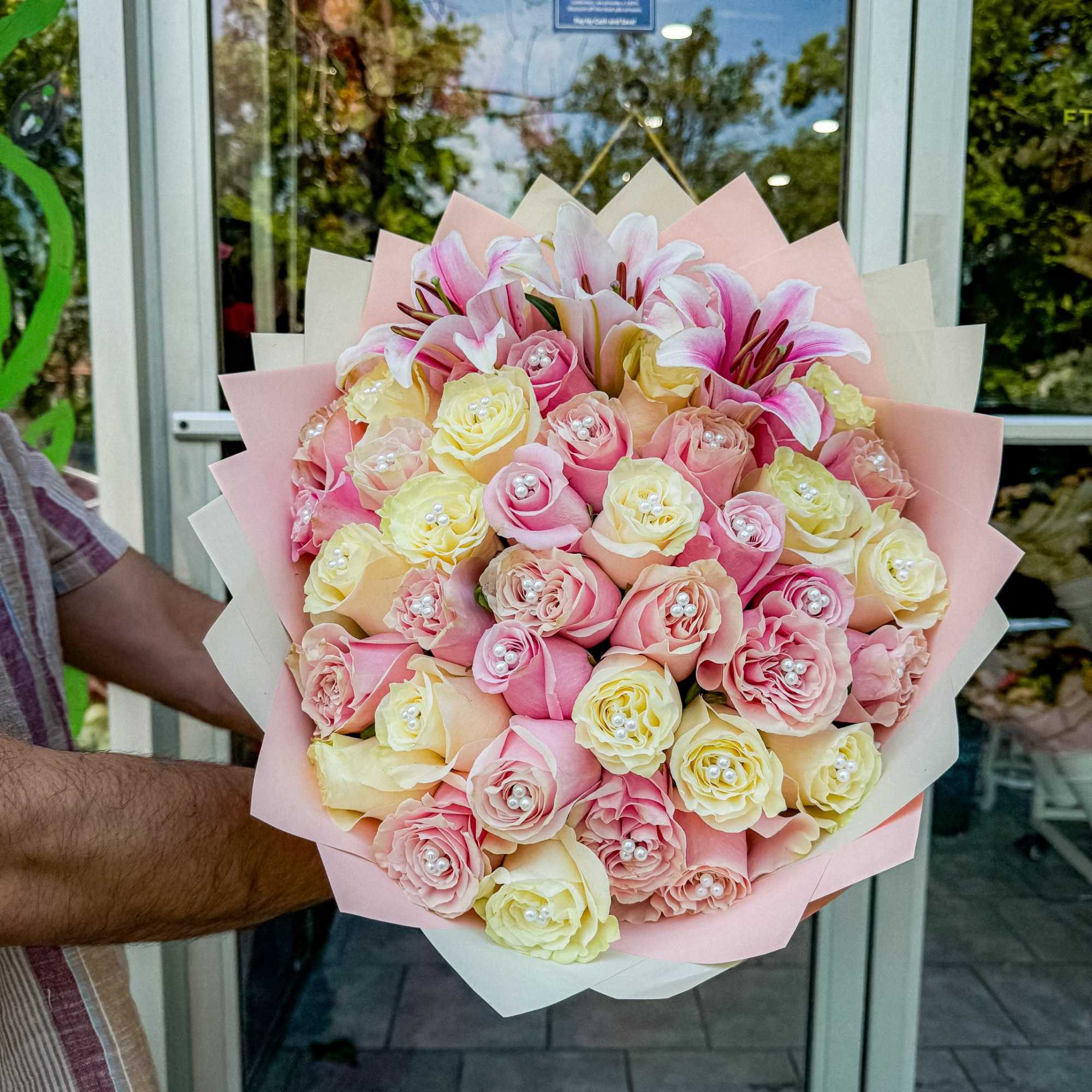 Rosy Lily Delight  evokes an image of floral elegance and charm.