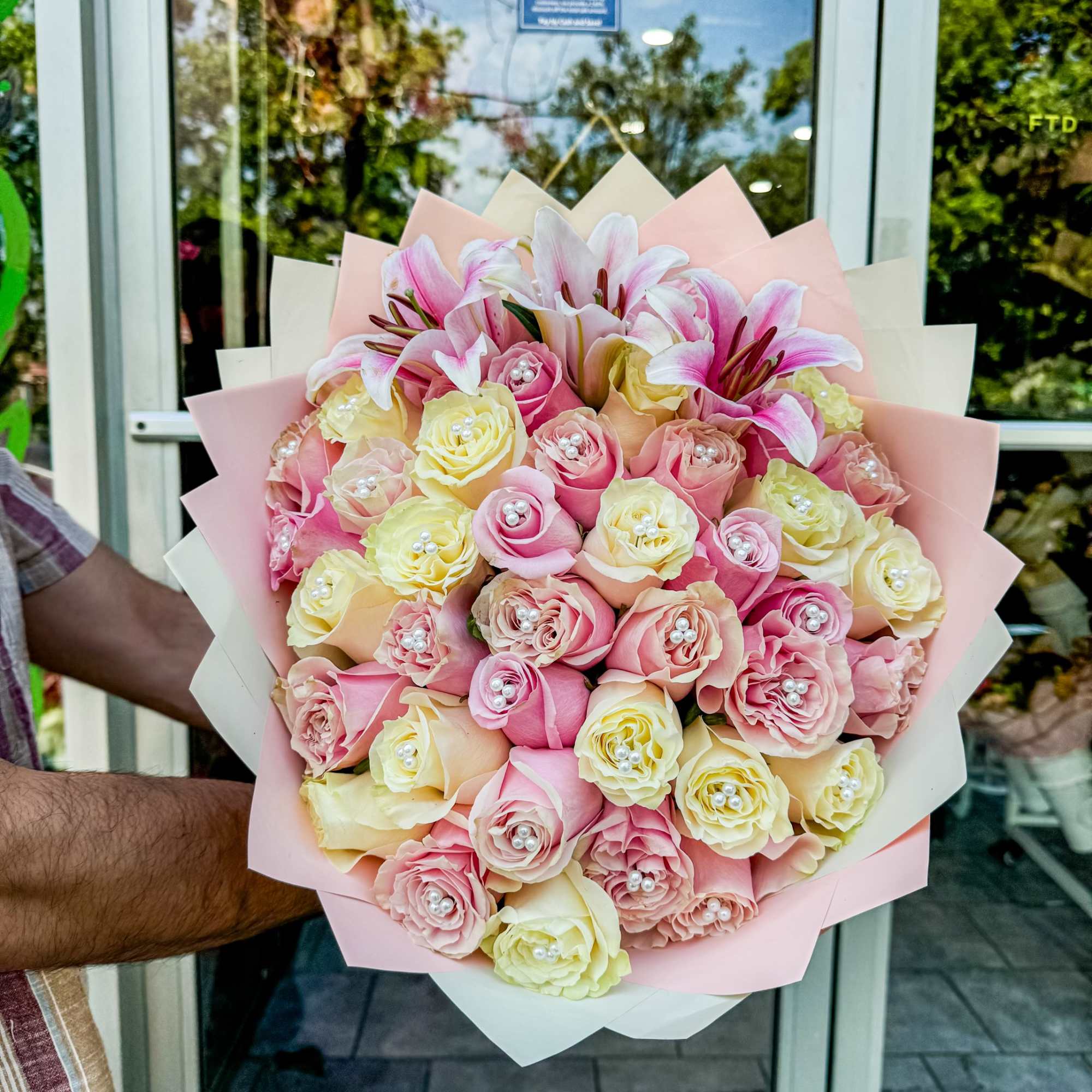 Rosy Lily Delight  evokes an image of floral elegance and charm.