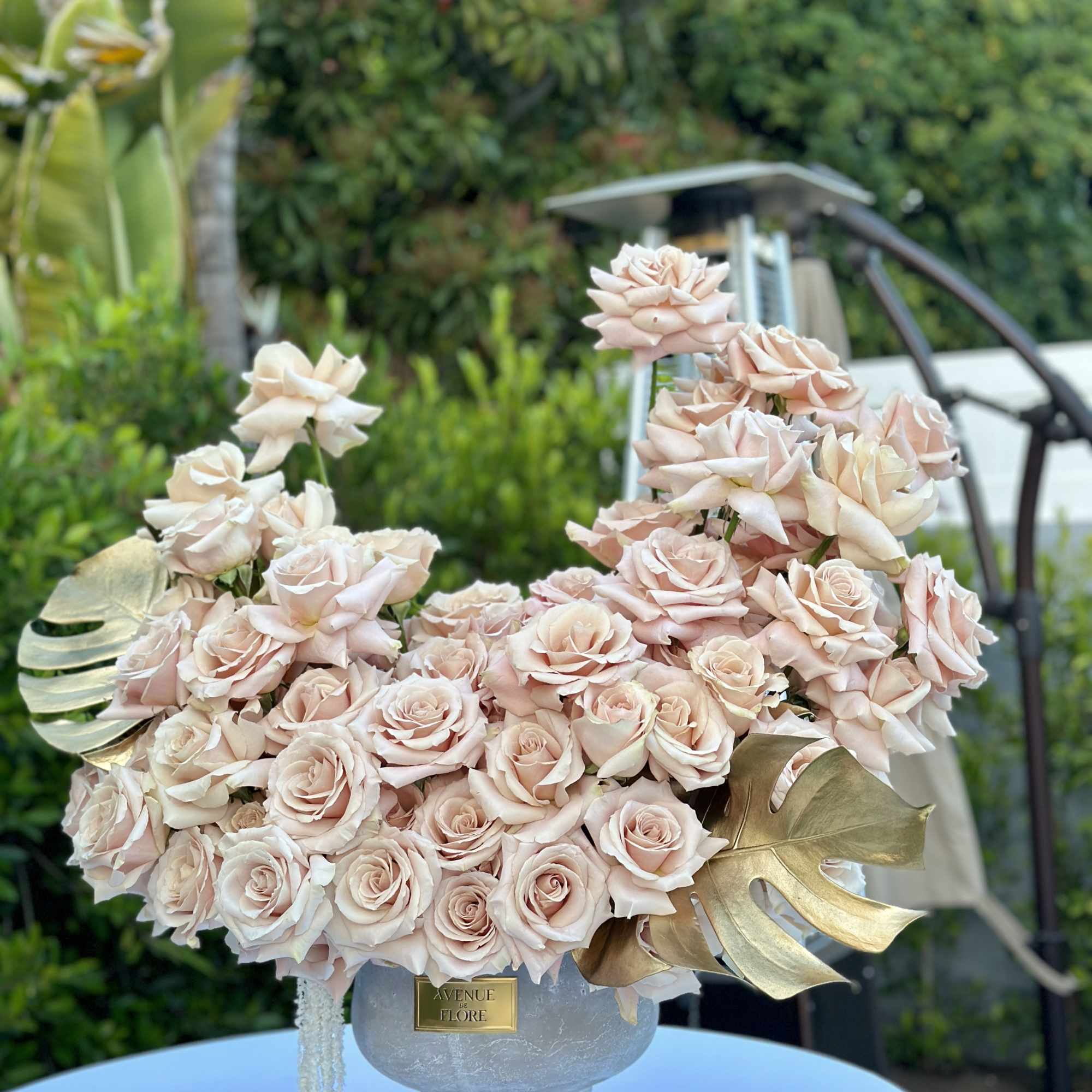 Set in a chic vase, this arrangement effortlessly elevates any room, bringing