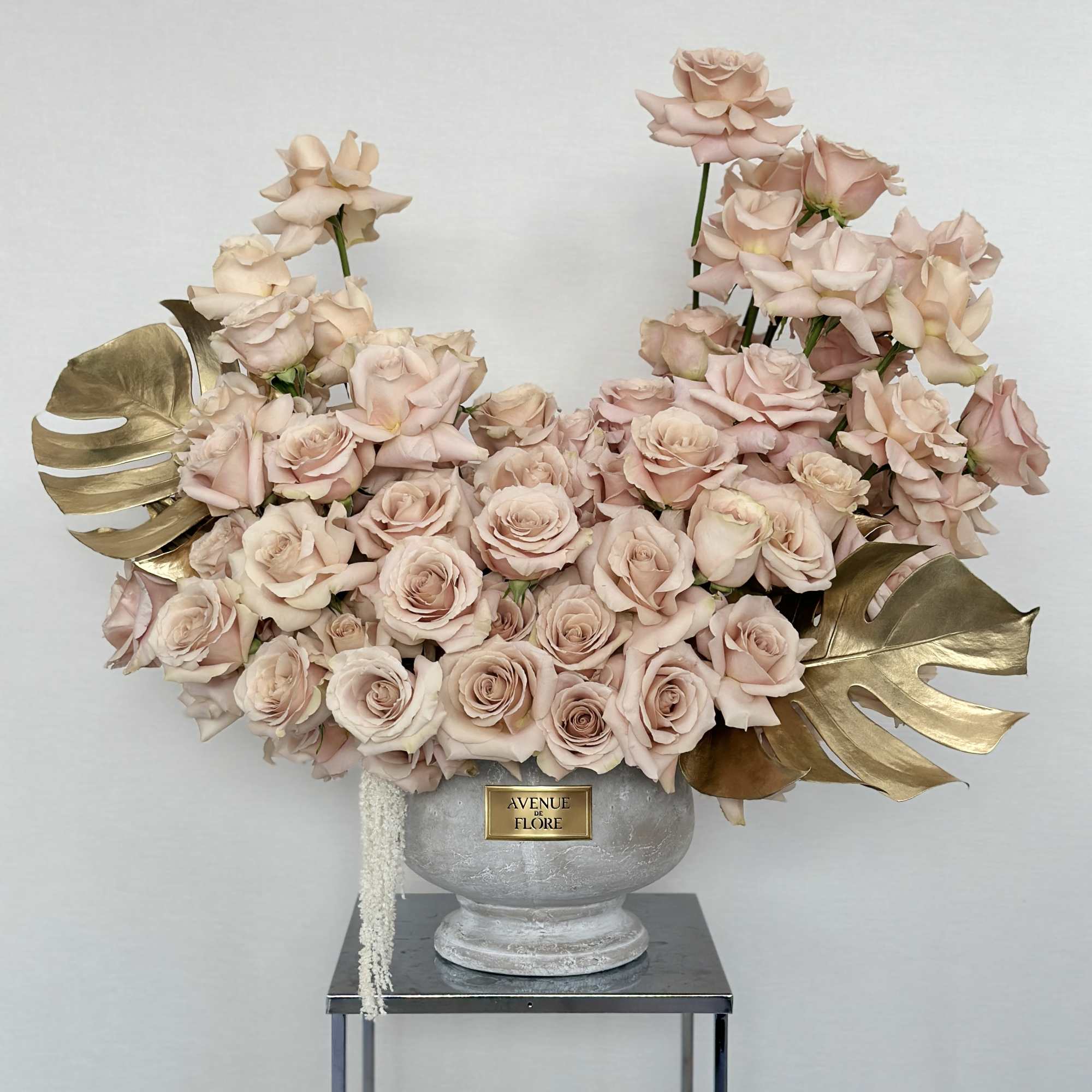 Set in a chic vase, this arrangement effortlessly elevates any room, bringing