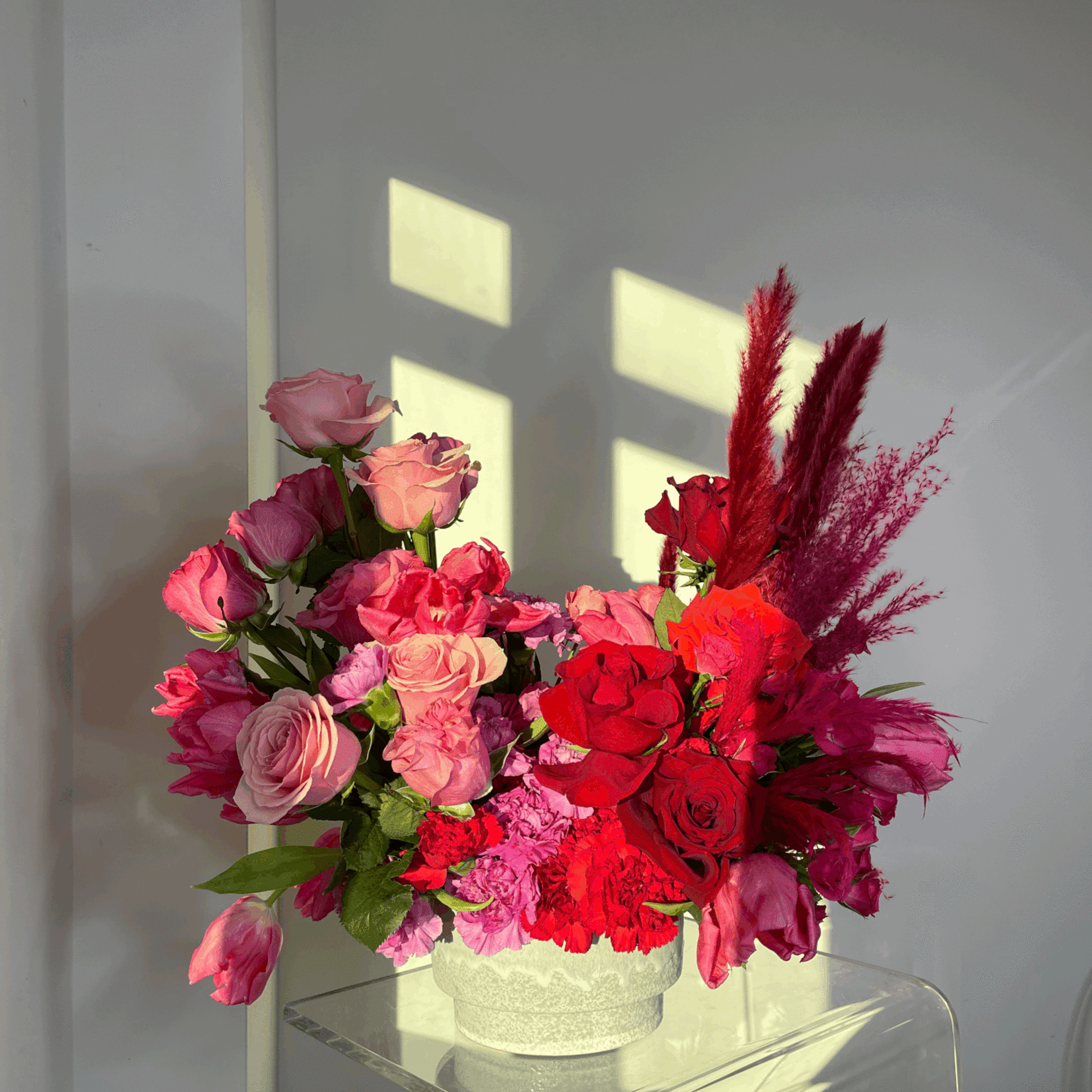- Covered in bright pink and red roses
- Vibrant leaves for accentuating