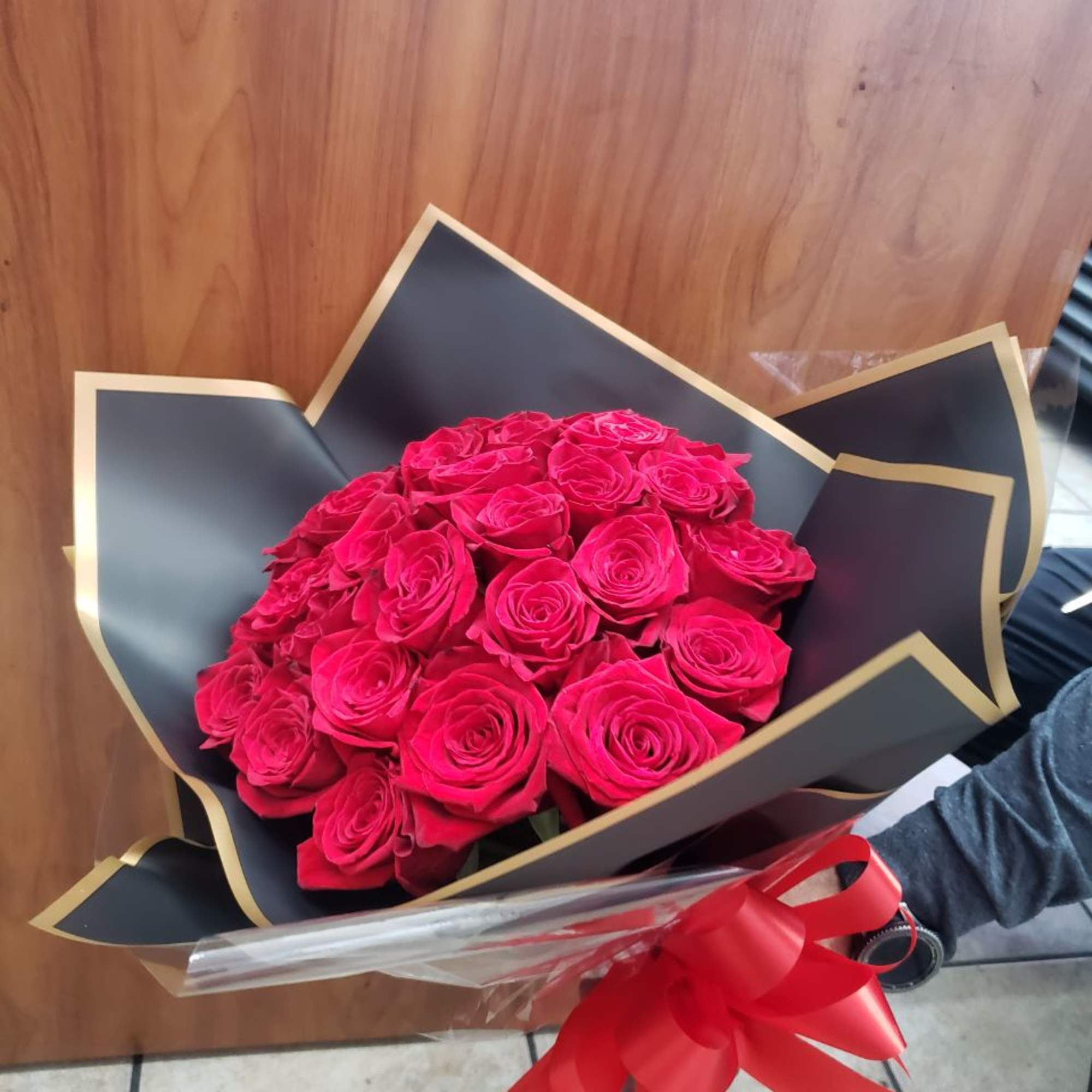 30 stems of gorgeous red roses   with  black 