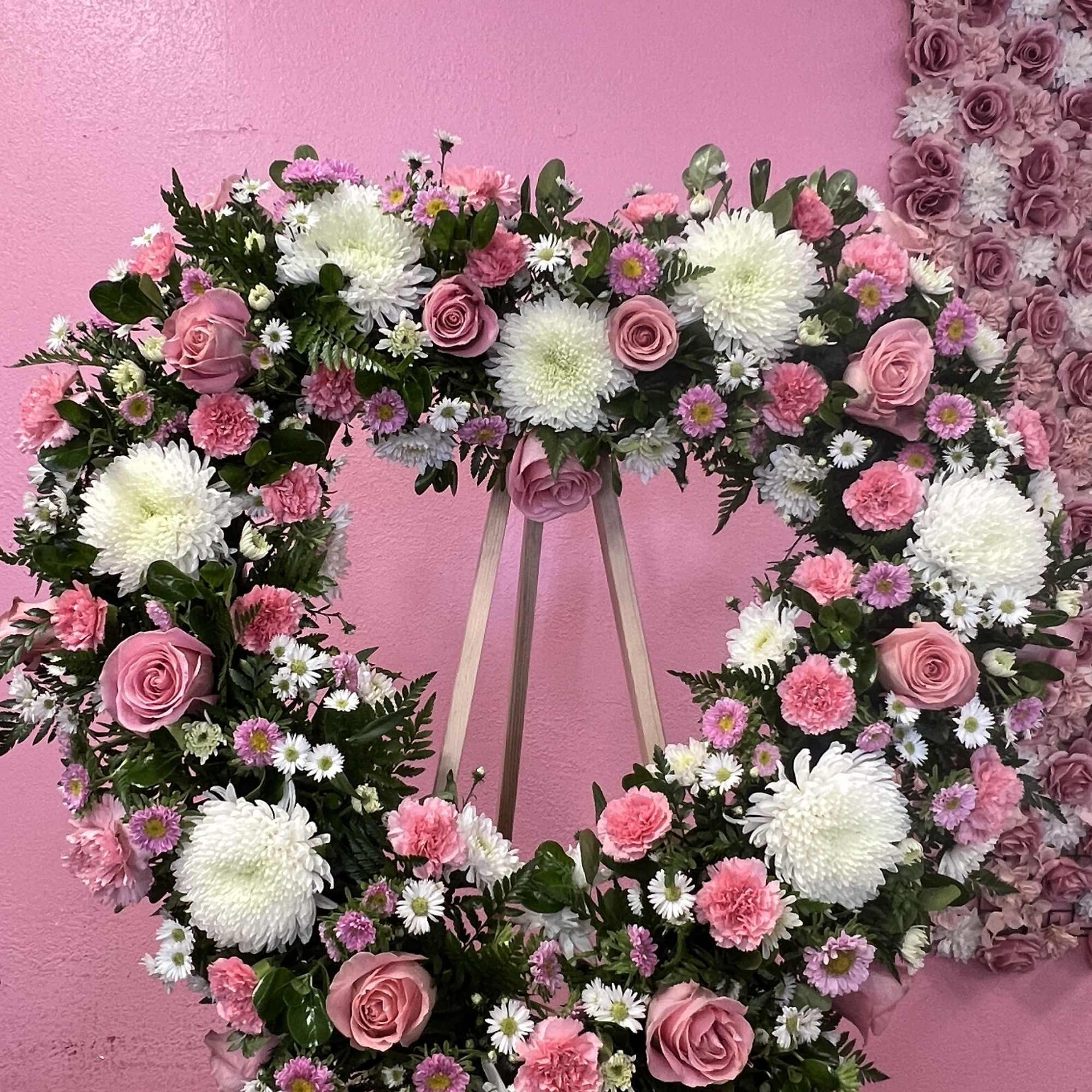 Funeral with white and pink flowers 