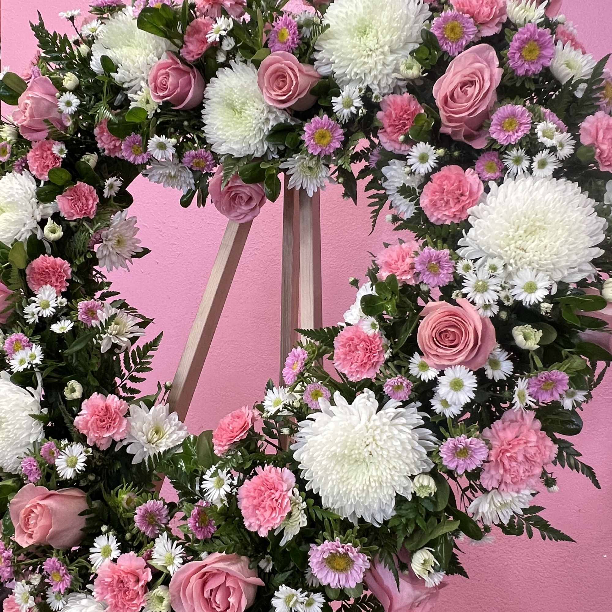 Funeral with white and pink flowers 