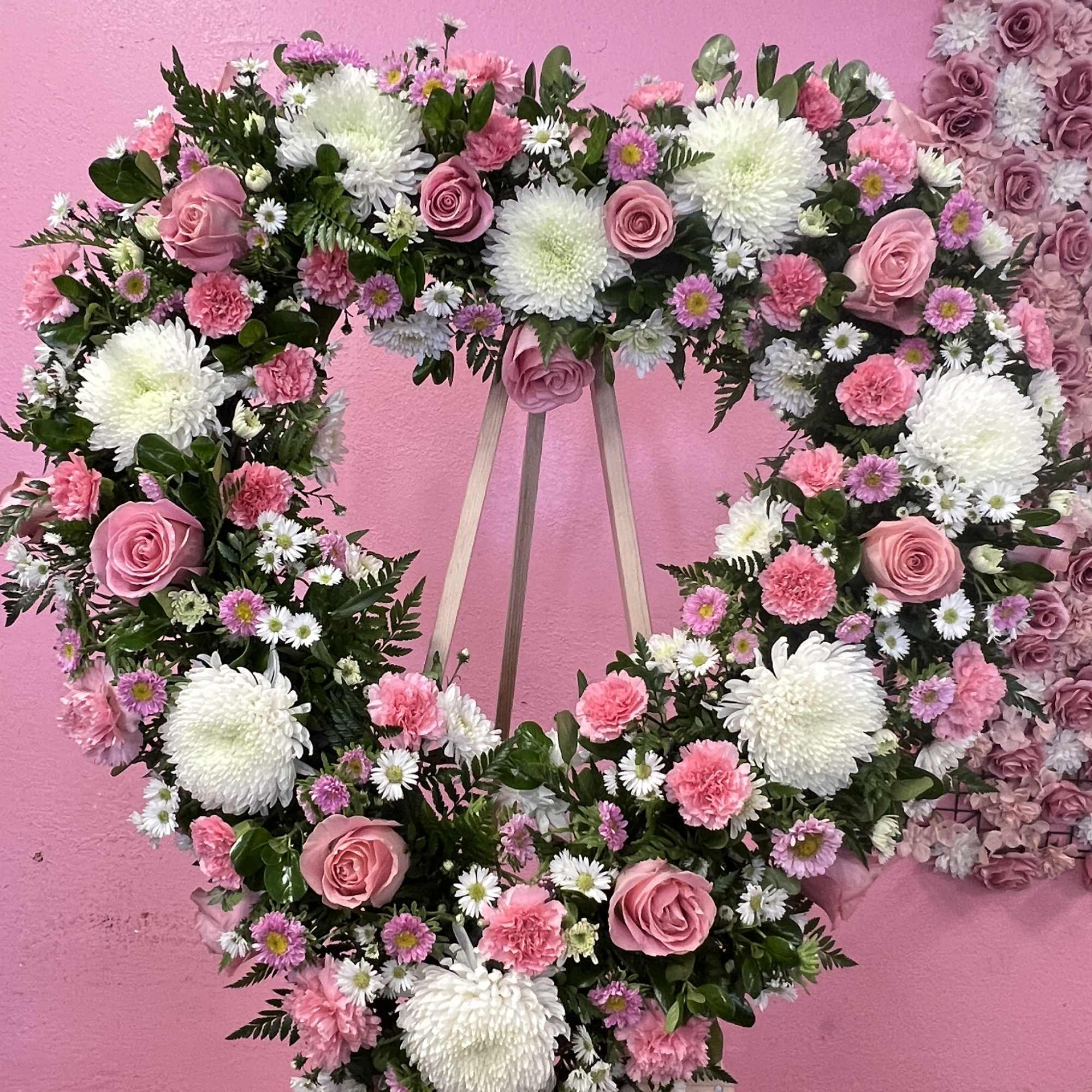 Funeral with white and pink flowers 