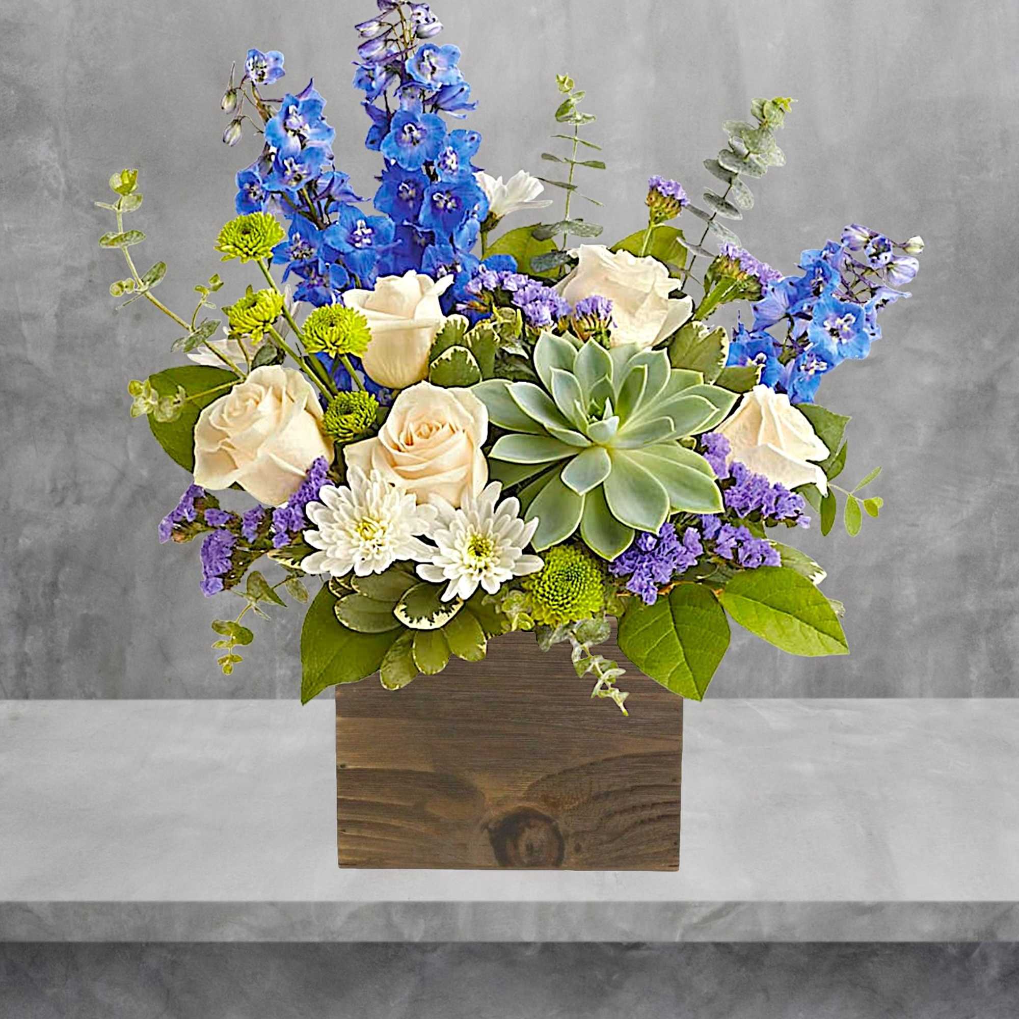 This Magnifique flower arrangement is a chic way to celebrate special moments
