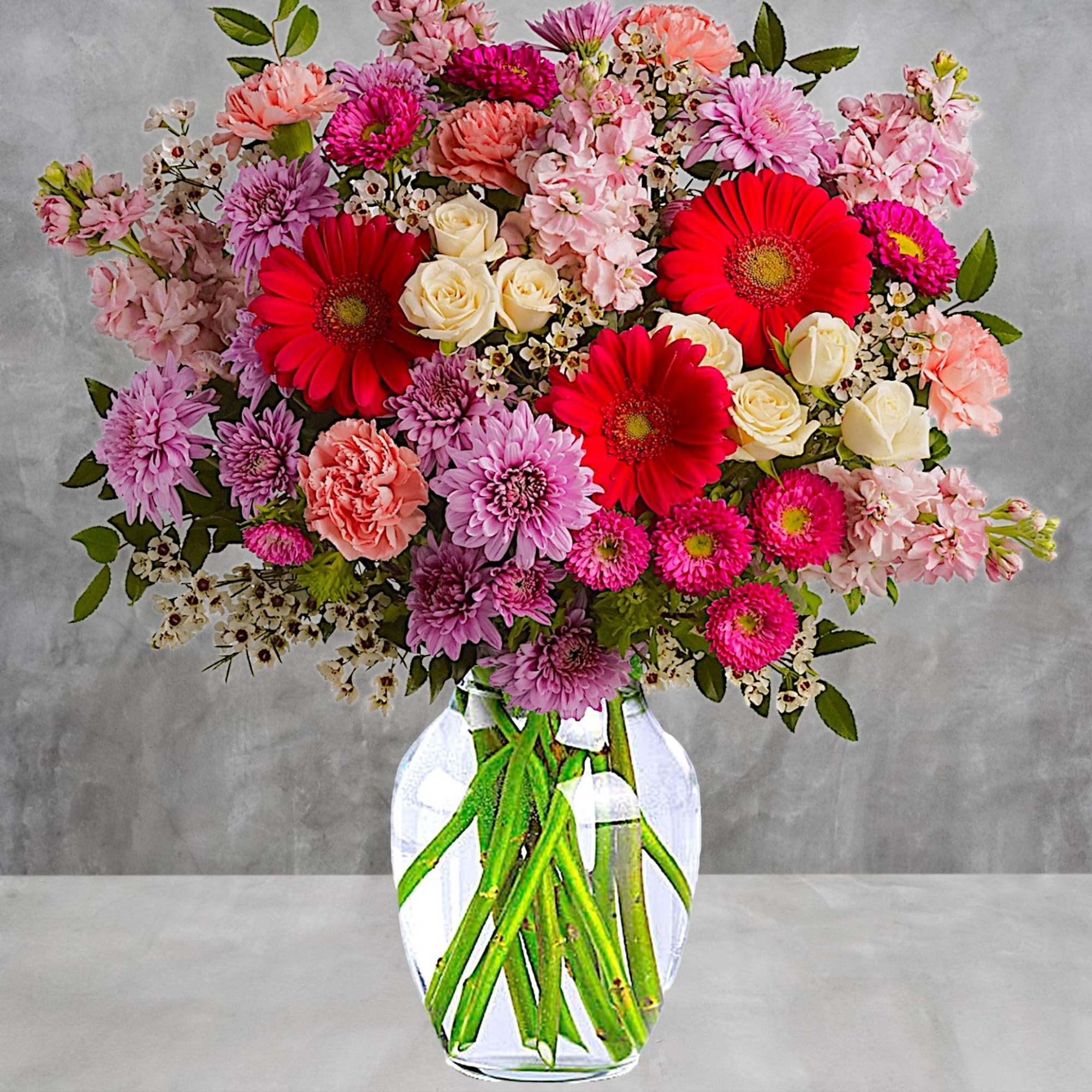 A perfectly pleasing mix of sweet feminine blossoms make this a truly