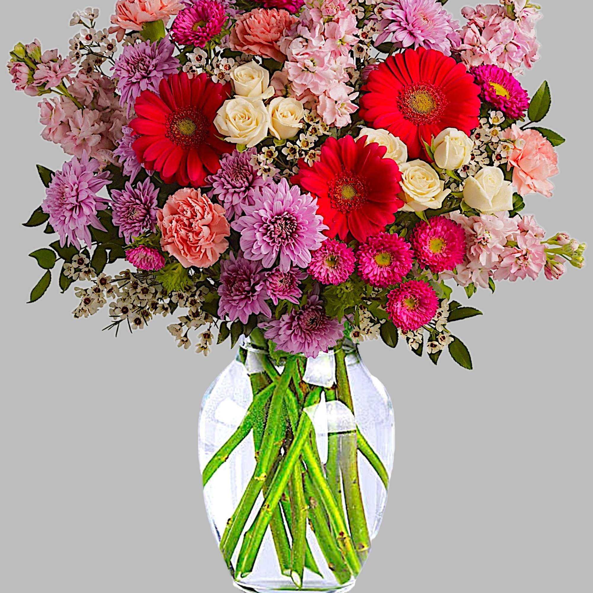 A perfectly pleasing mix of sweet feminine blossoms make this a truly