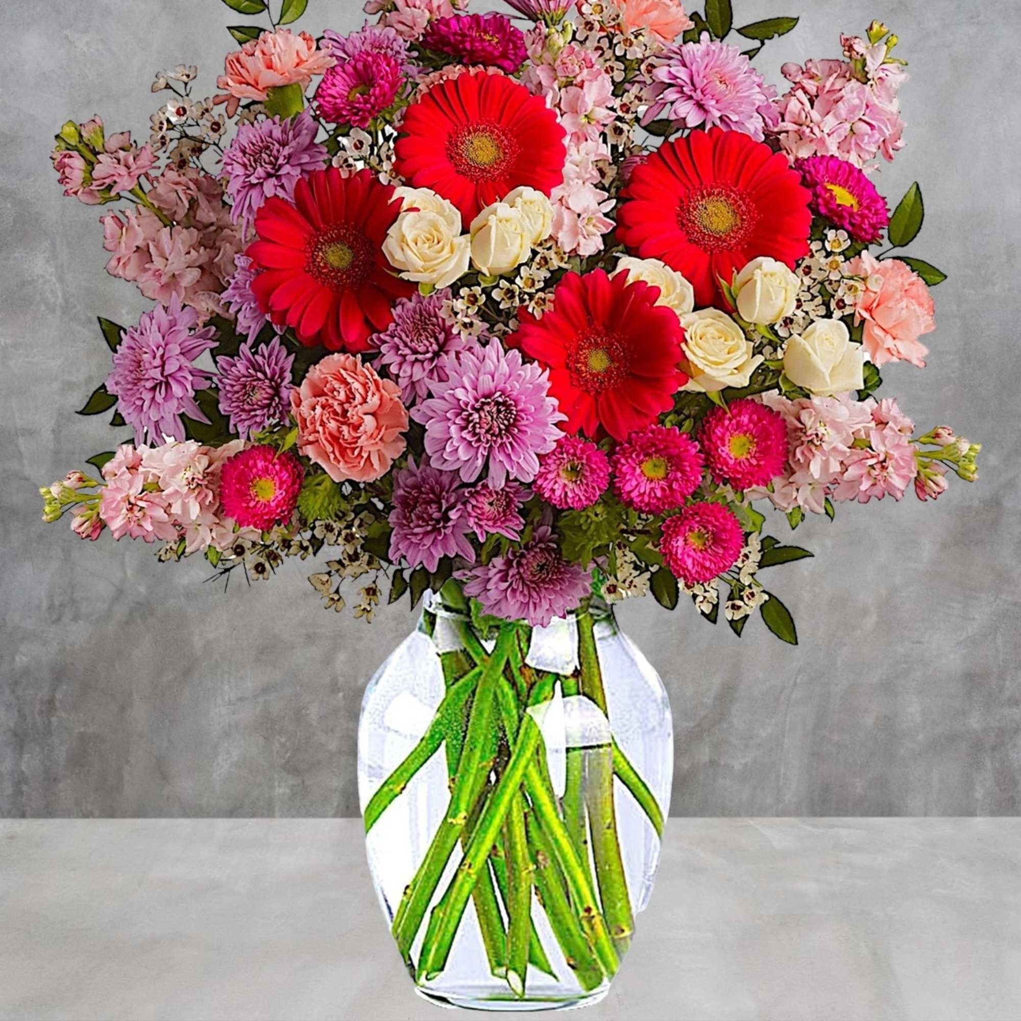 A perfectly pleasing mix of sweet feminine blossoms make this a truly