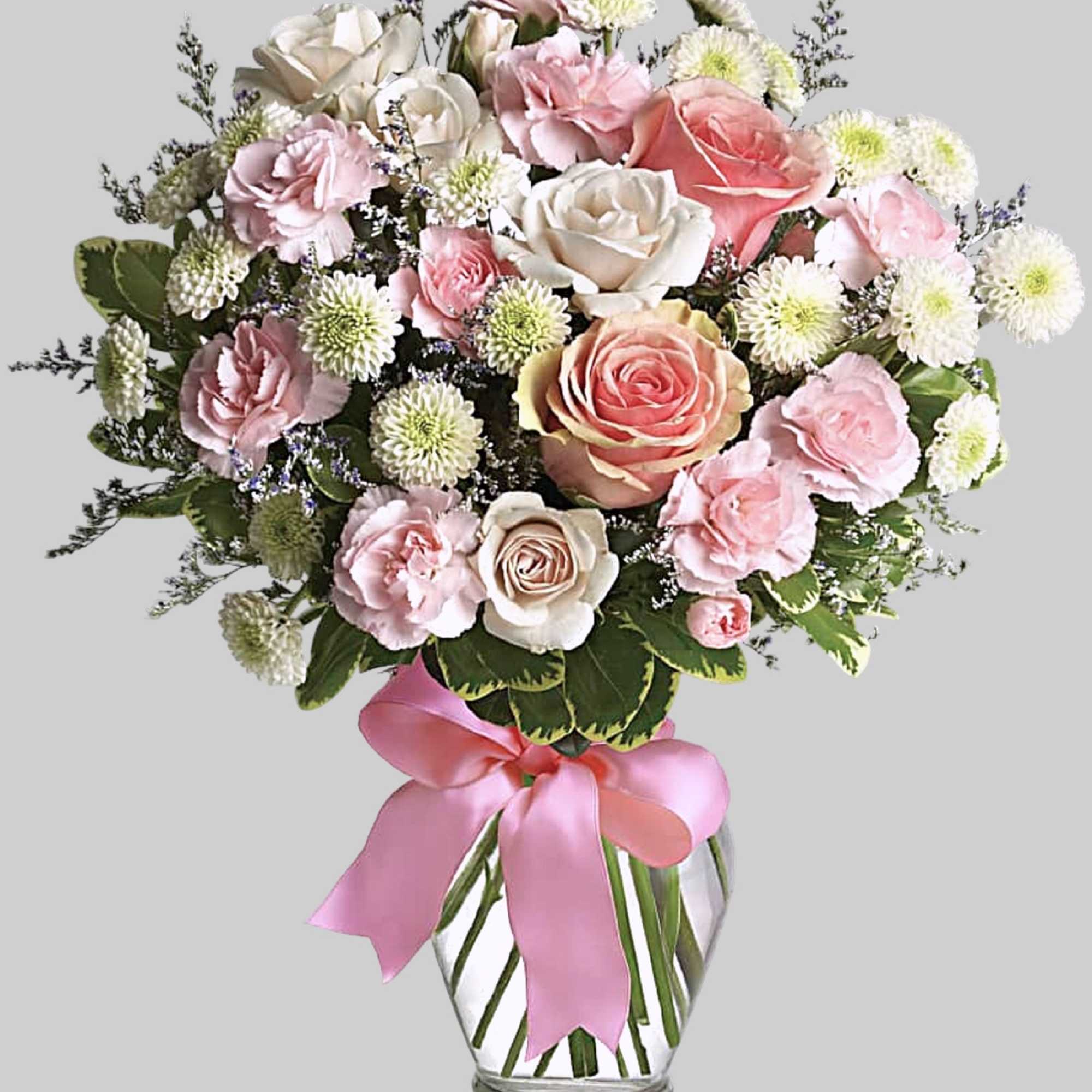 Sweet as candy! This soft pink and white bouquet is a feminine