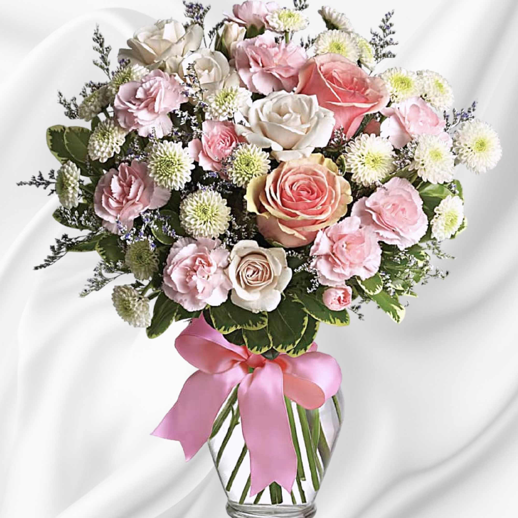 Sweet as candy! This soft pink and white bouquet is a feminine