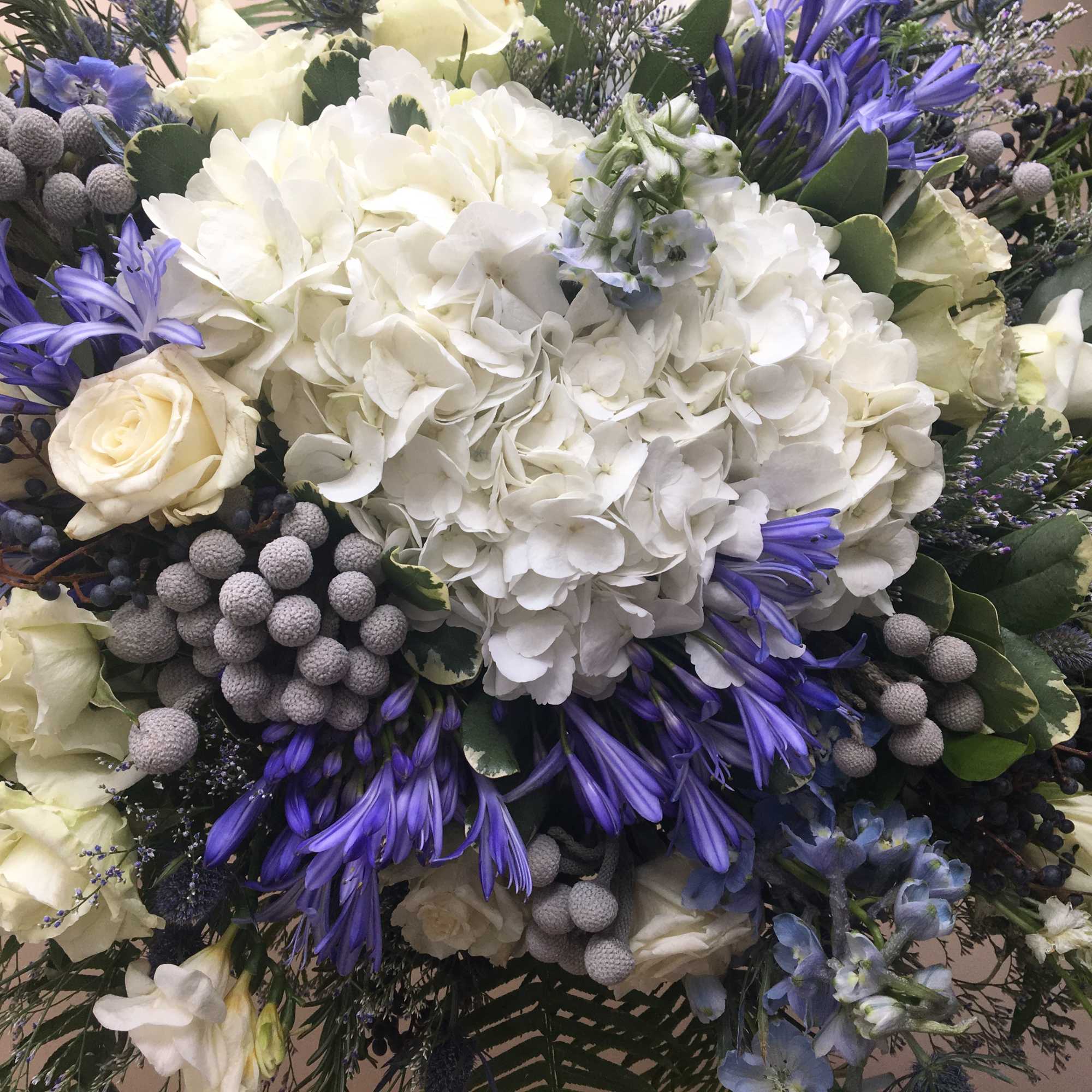 The Water is a gorgeous standing sympathy spray of calming blue, white