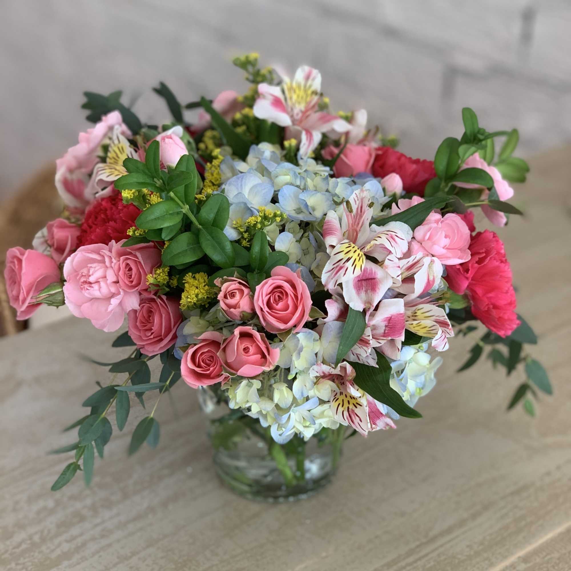 Mixture of colorful, seasonally appropriate flowers  Mixture of colorful, seasonally appropriate flowers