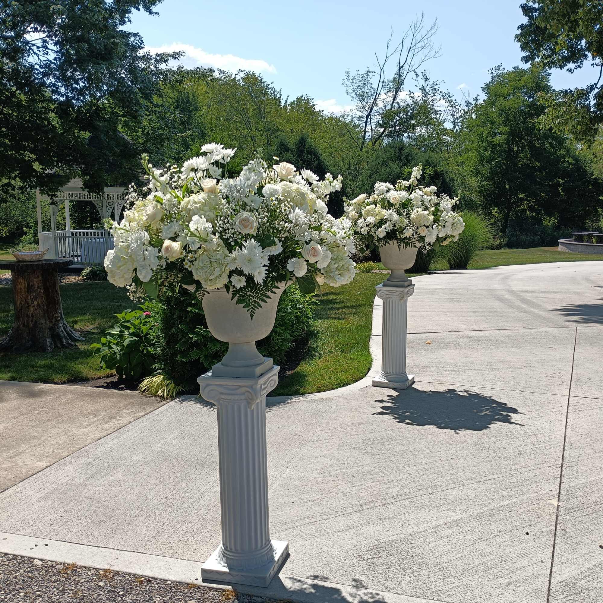 Beautiful white roses, hydrangeas, daisies, carnations, baby's breath and other filler flowers