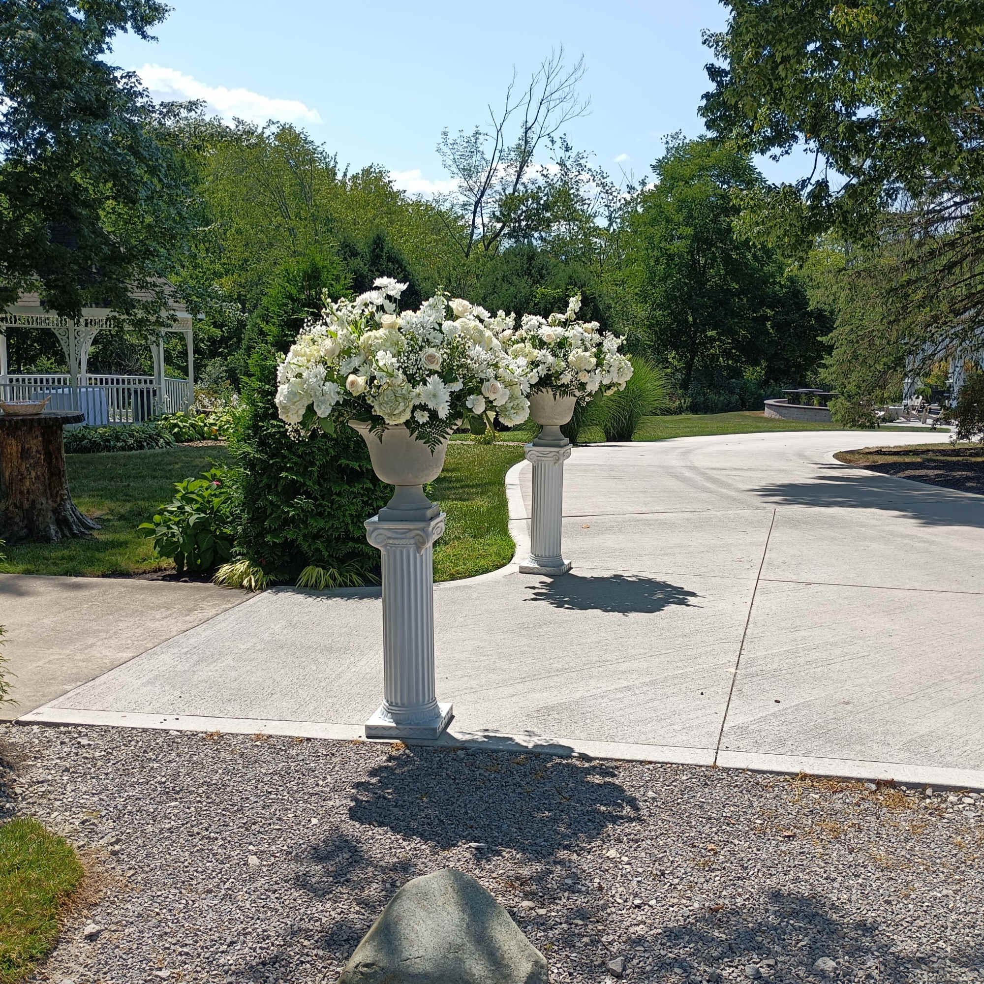 Beautiful white roses, hydrangeas, daisies, carnations, baby's breath and other filler flowers