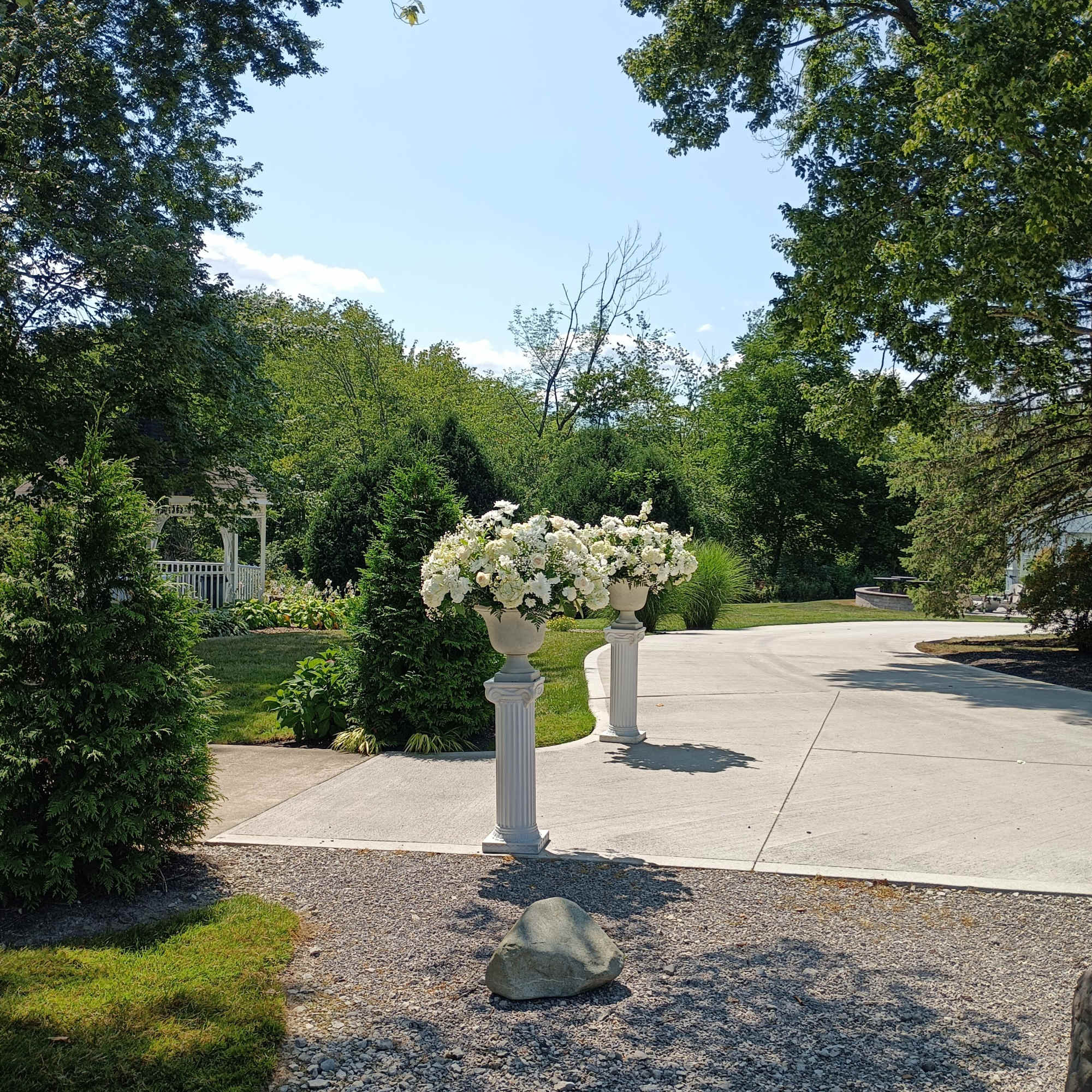 Beautiful white roses, hydrangeas, daisies, carnations, baby's breath and other filler flowers