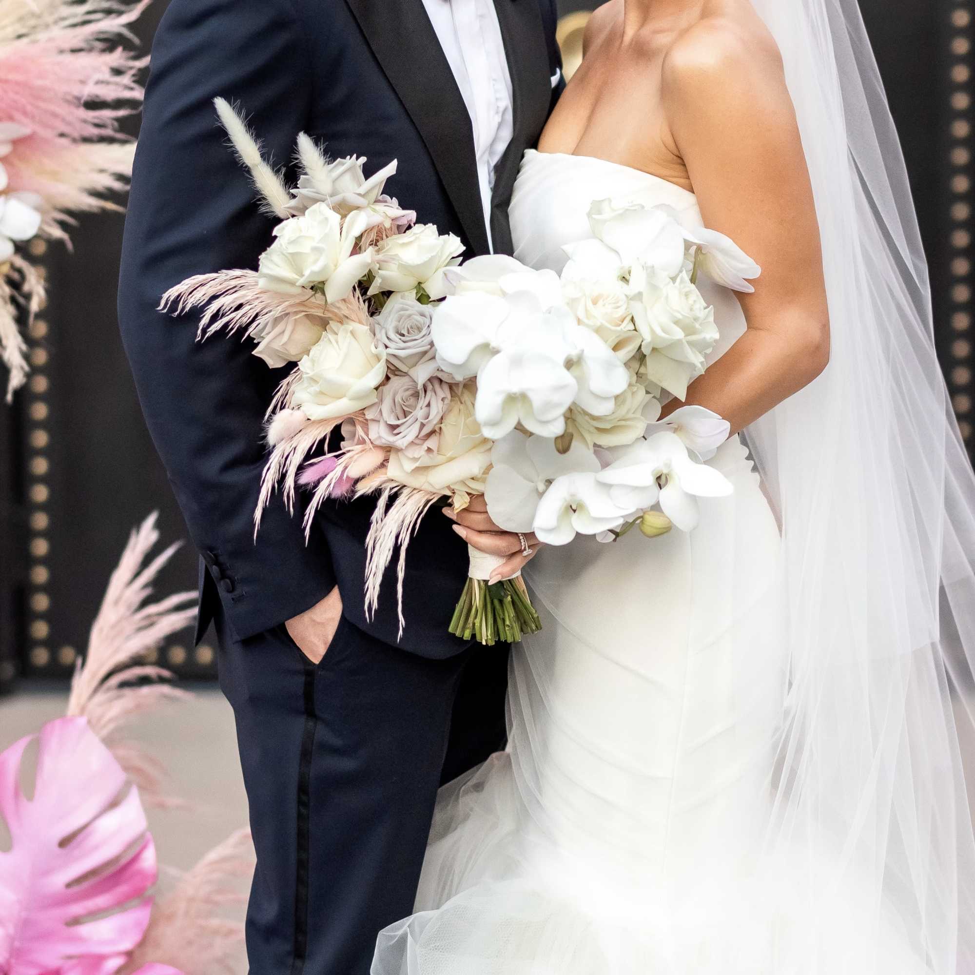 - Elegant white orchids paired with delicate pale pink and purple-toned accent