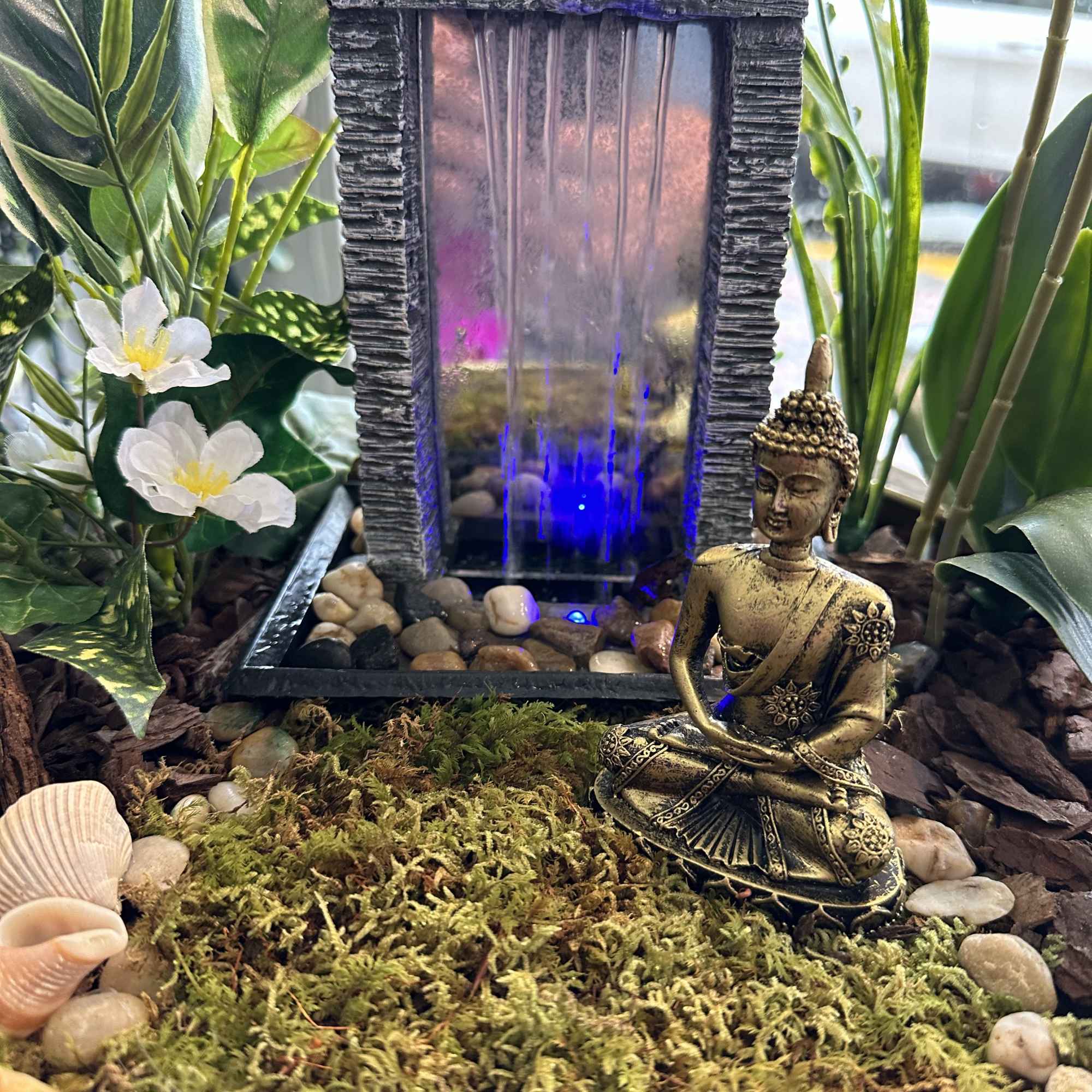 A beautiful ZEN dishgarden including a little fountain and a cute little