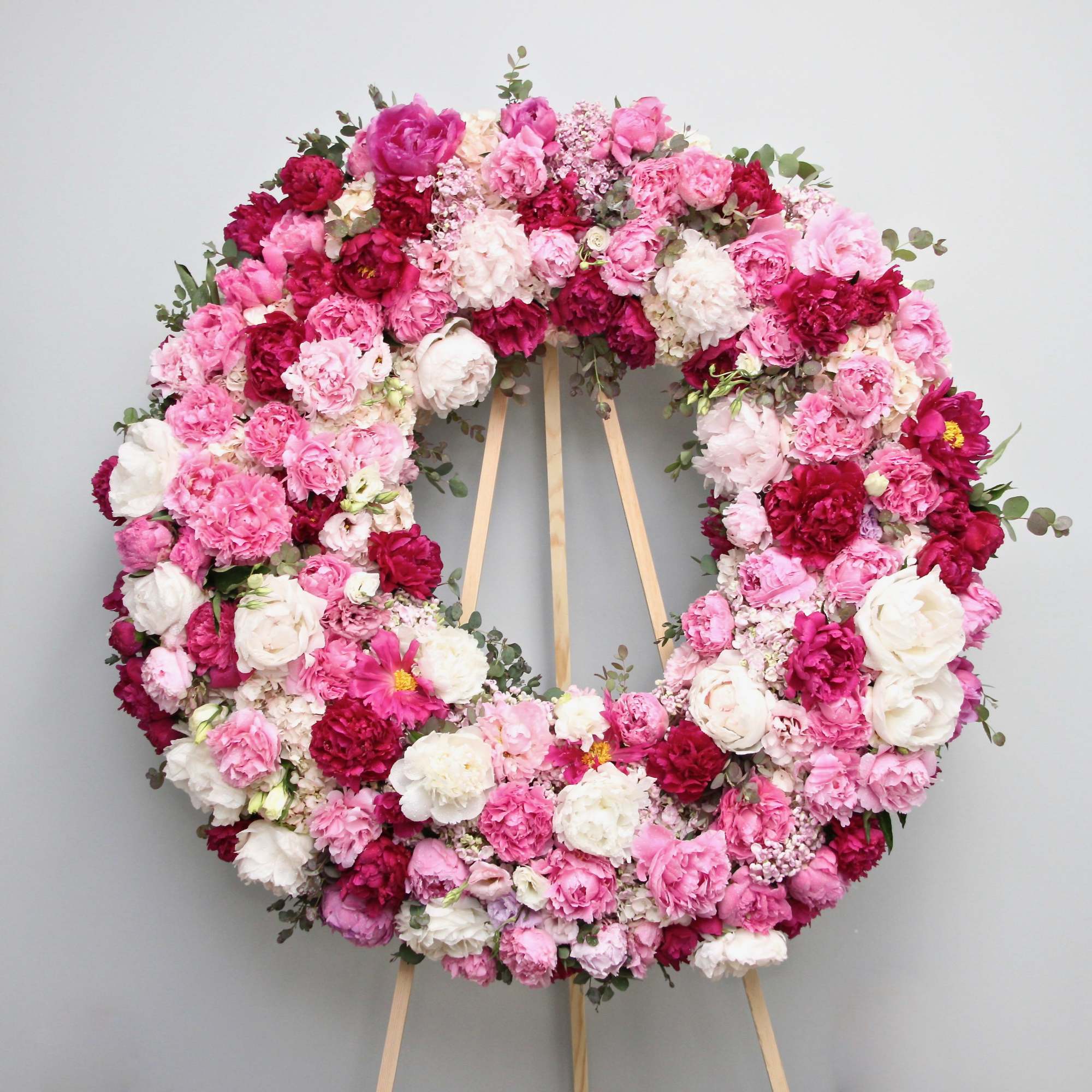 Peonies, Garden roses, orchids, hydrangeas, roses, &amp; lisianthus on a wreath.

We include