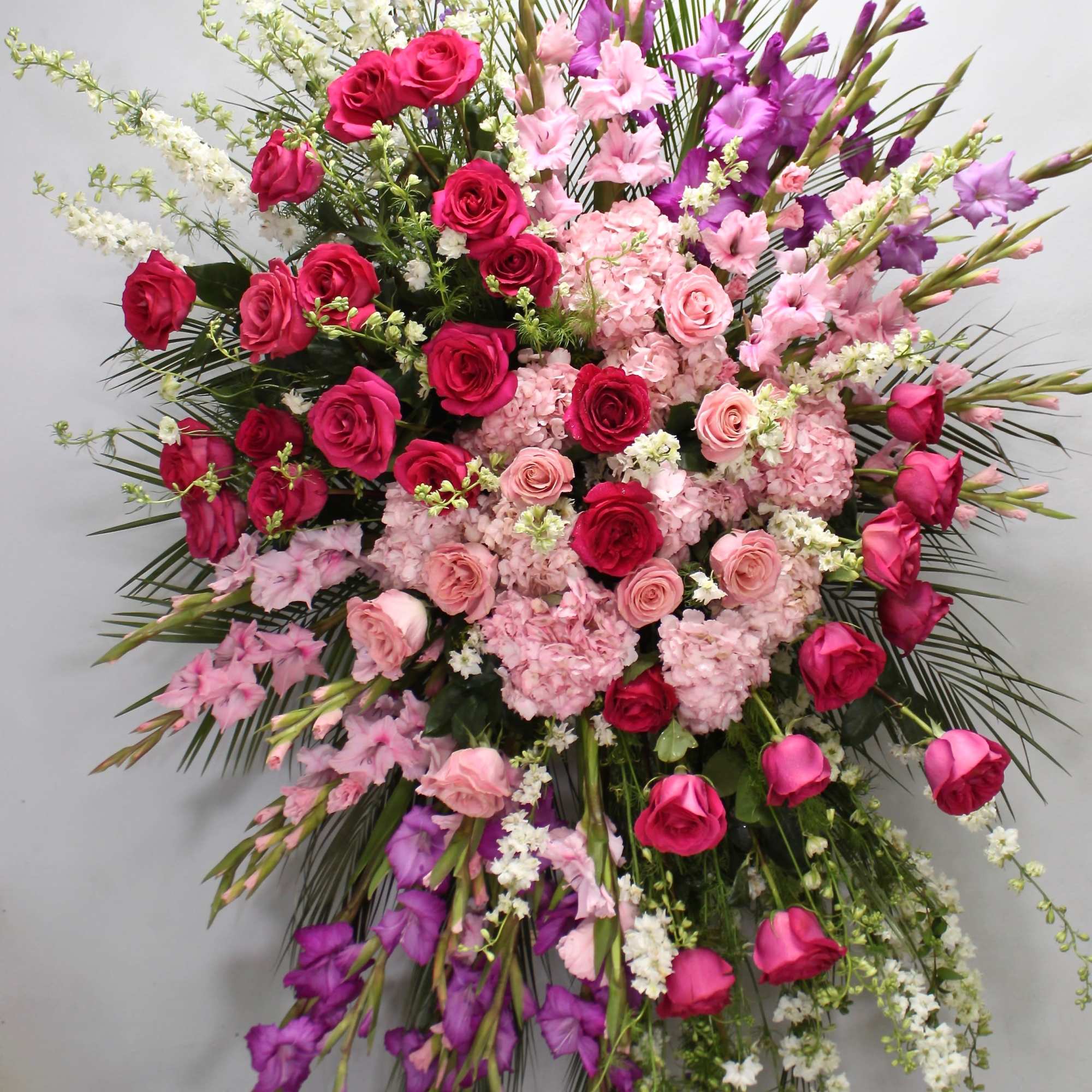 With a bright color palette, this spray includes several shades of pink