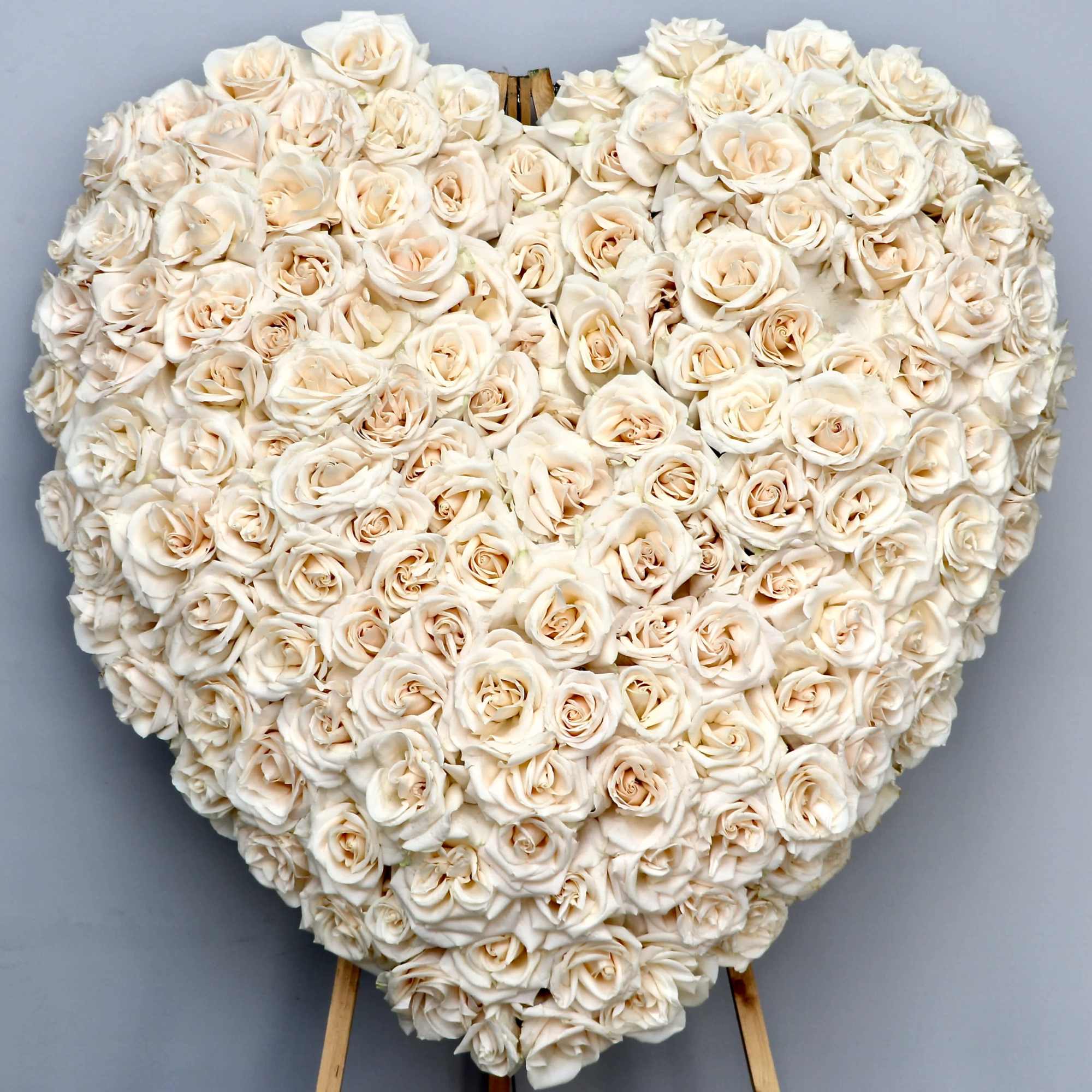 This sympathy heart is packed with beautiful and graceful white roses.

We include
