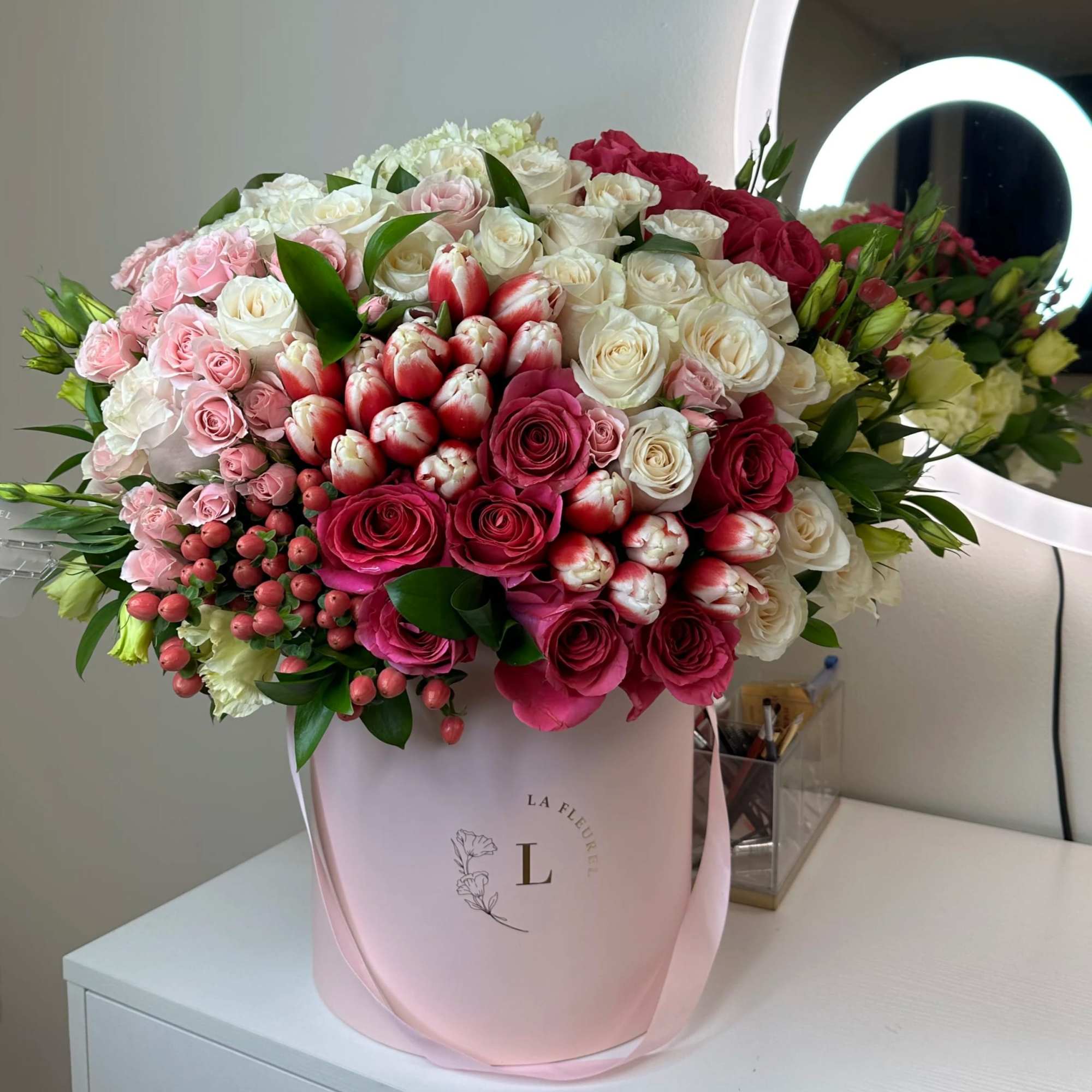 This beautiful arrangement filled with the roses, tulips, hydrangeas and greens to
