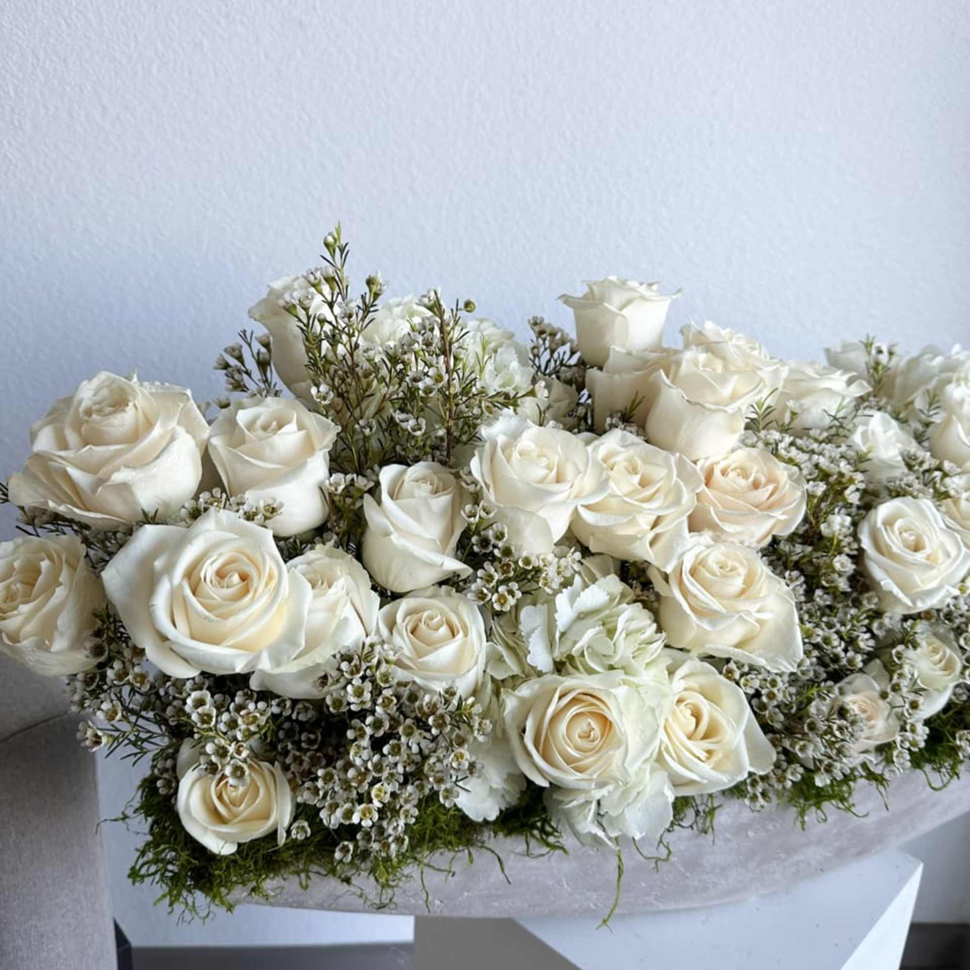 A chic rendezvous of nature and urban style, our Modern Concrete Blossom