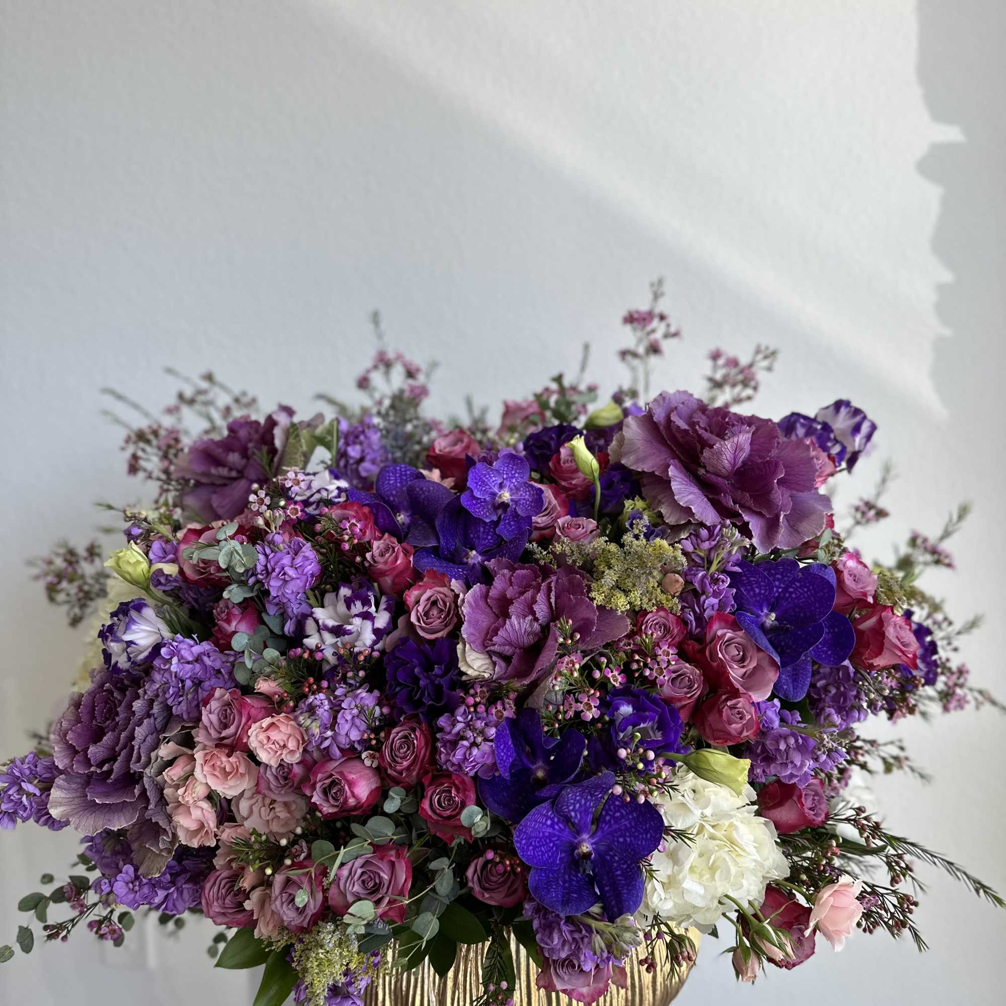 This beautiful arrangement filled with the roses and orchids to deliver your