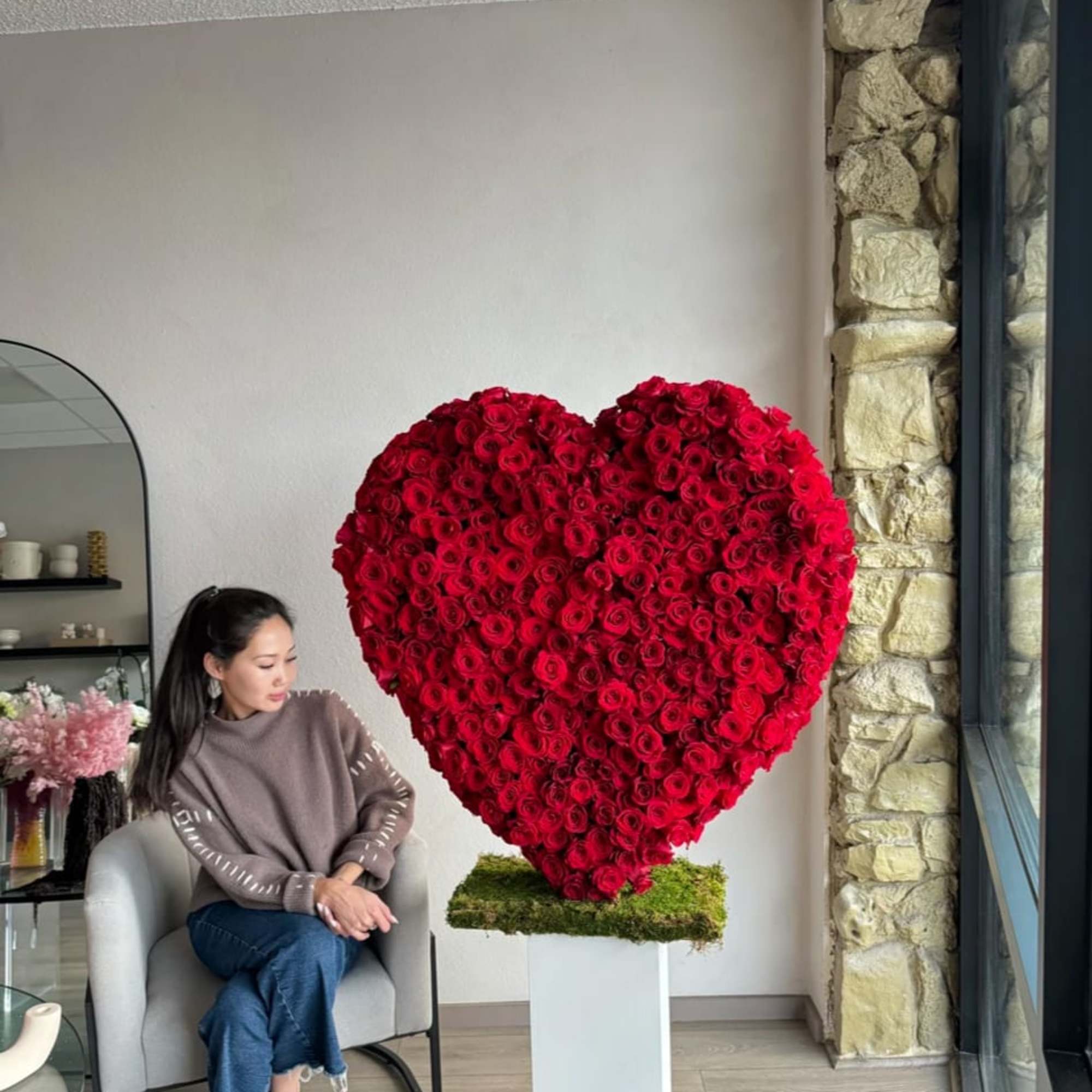 This beautiful arrangement filled with the 300-320 red roses and orchids to