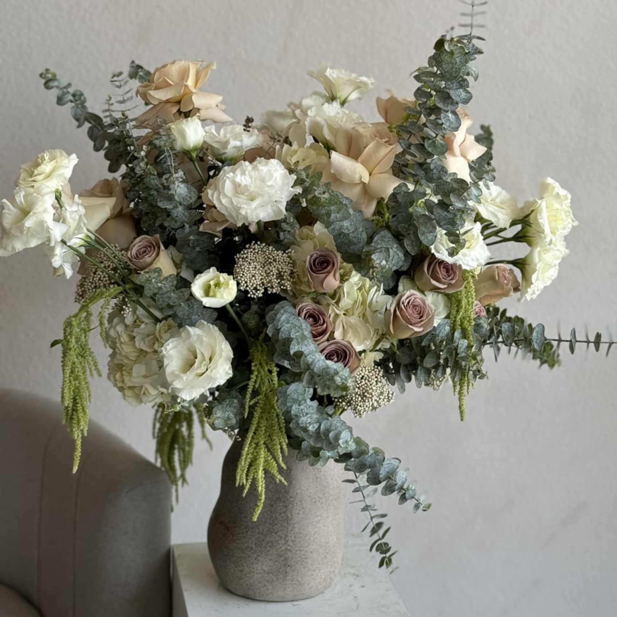 Embrace the serene beauty of nature with our Woodland Wonders arrangement. Featuring
