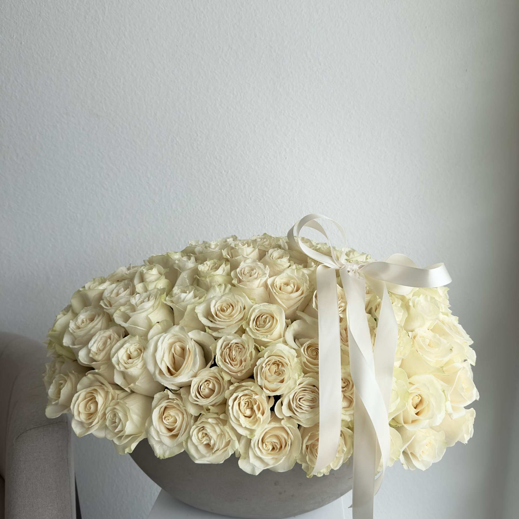 100-125 WHITE ROSES 

This breathtaking arrangement includes white roses. 
Perfect for any