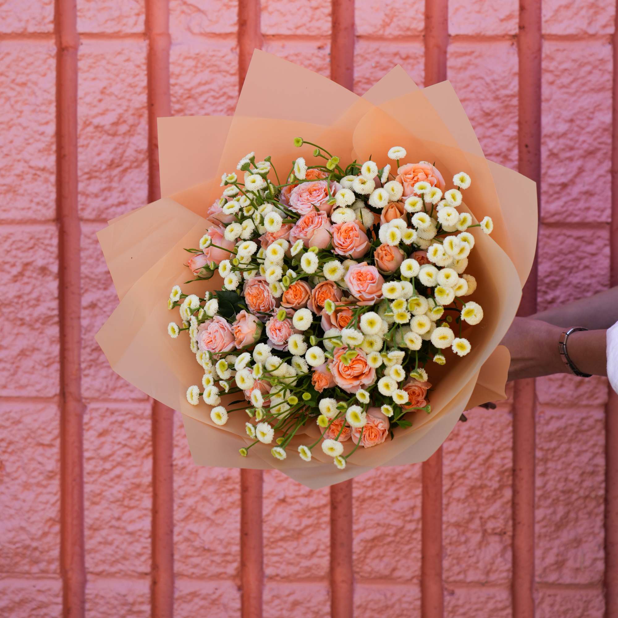 The Sunny Delight Bouquet is a cheerful and vibrant arrangement that brings