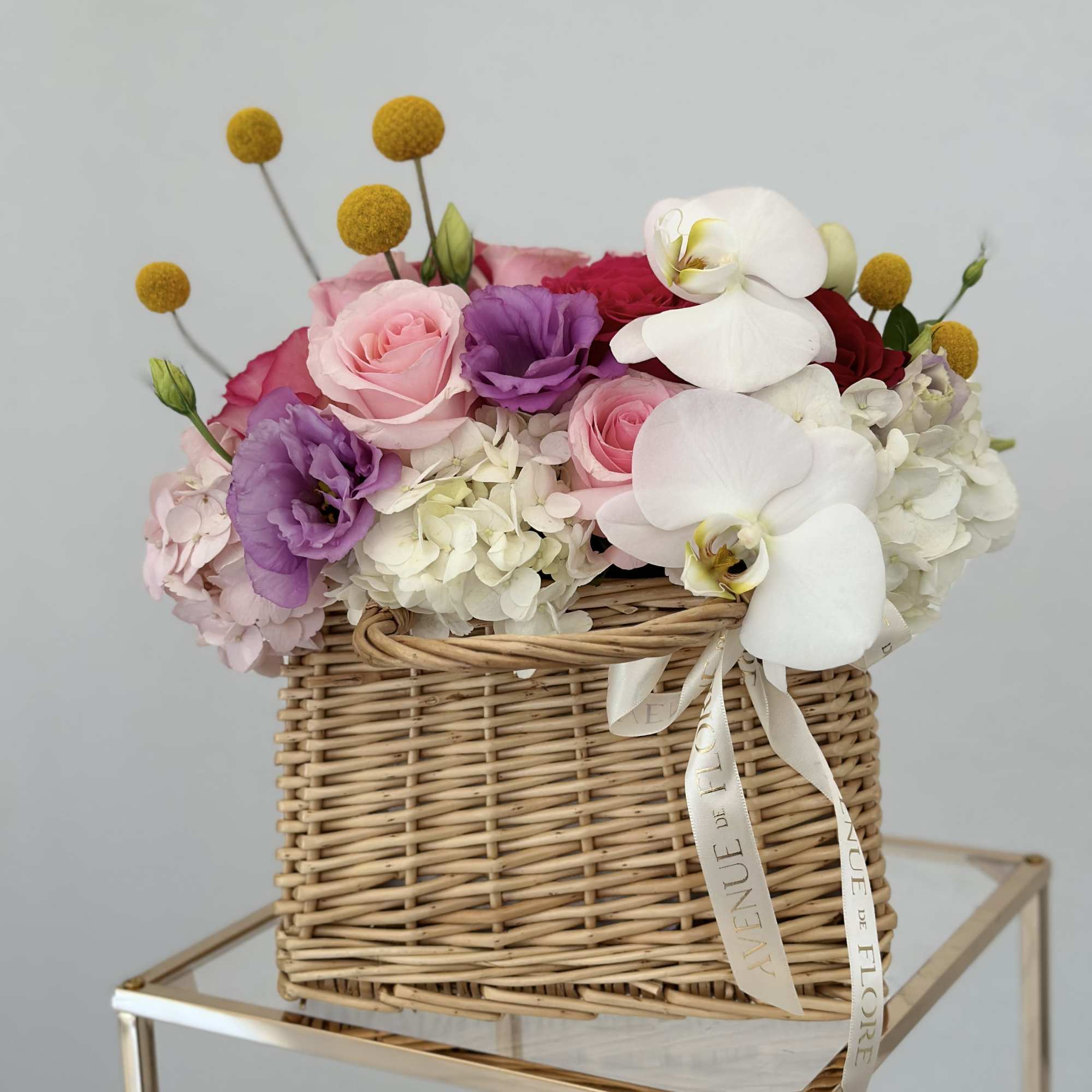 Enhance any occasion with this stunning arrangement, featuring a beautiful blend roses